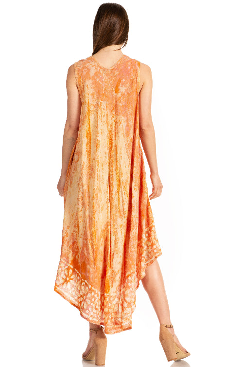 Woman wearing an orange floral dress on a white background