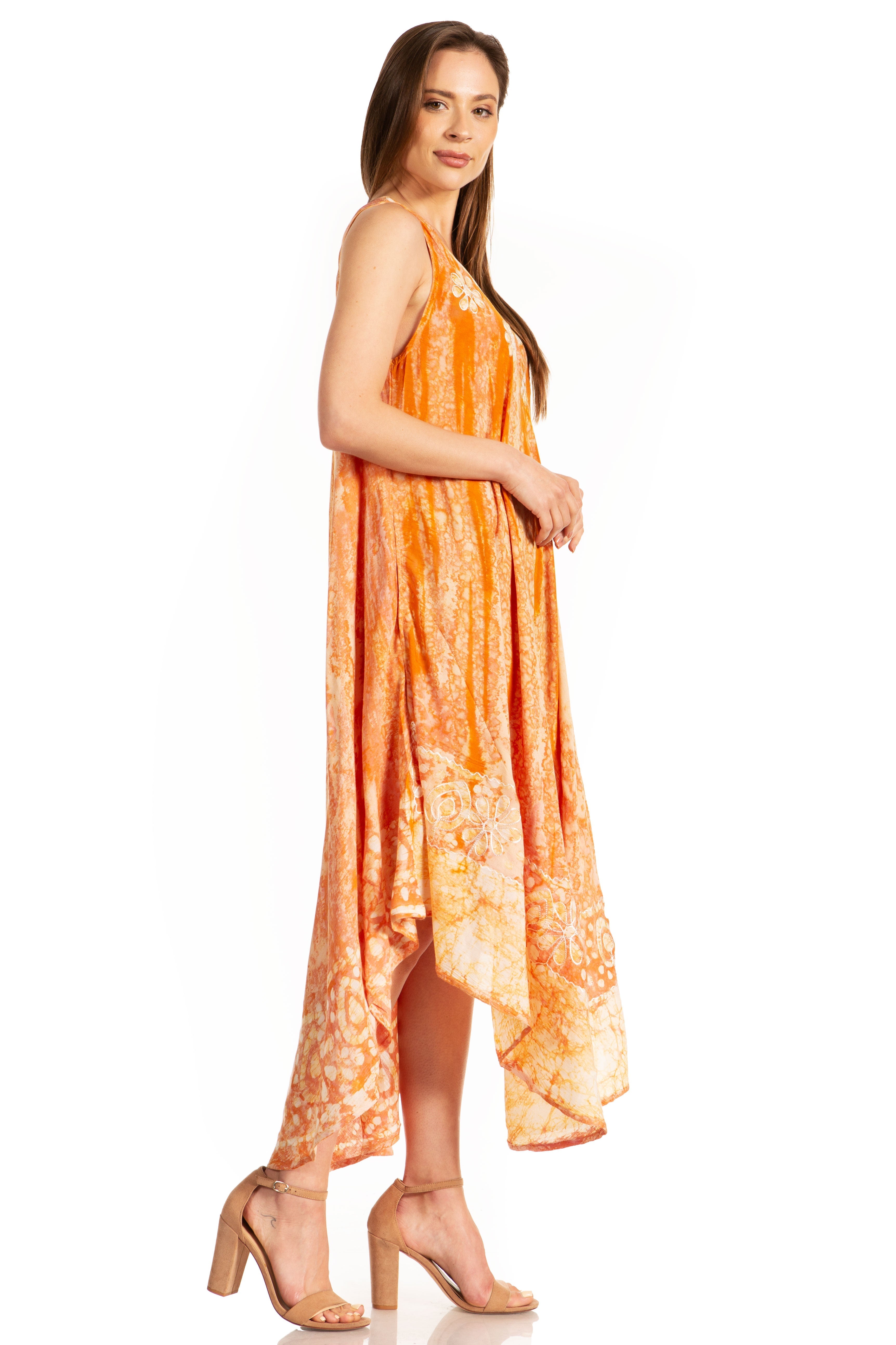 Woman wearing an orange tie-dye dress on a white background