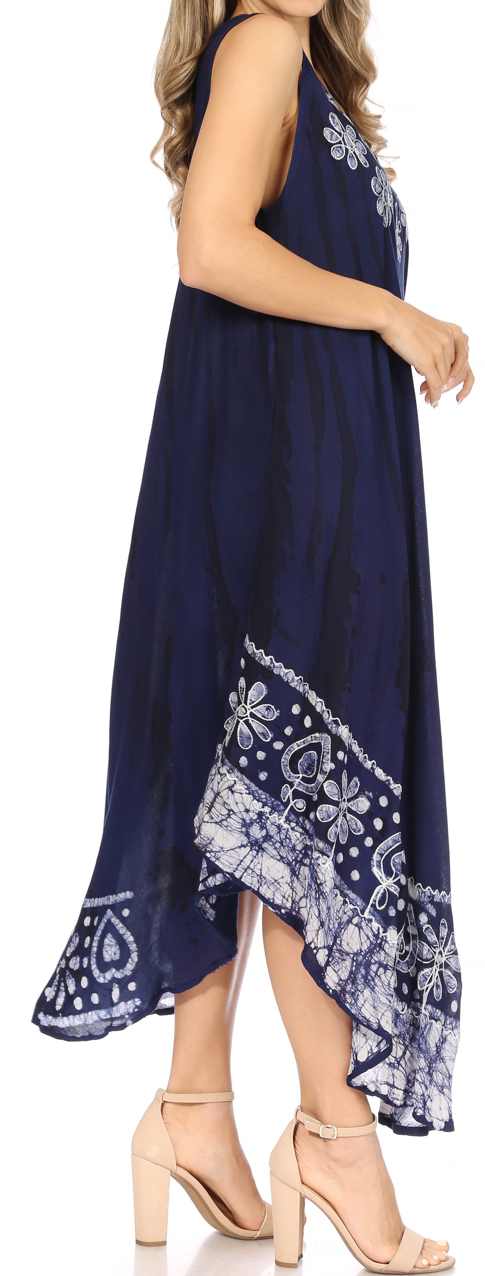 Navy blue dress with white floral patterns on a white background