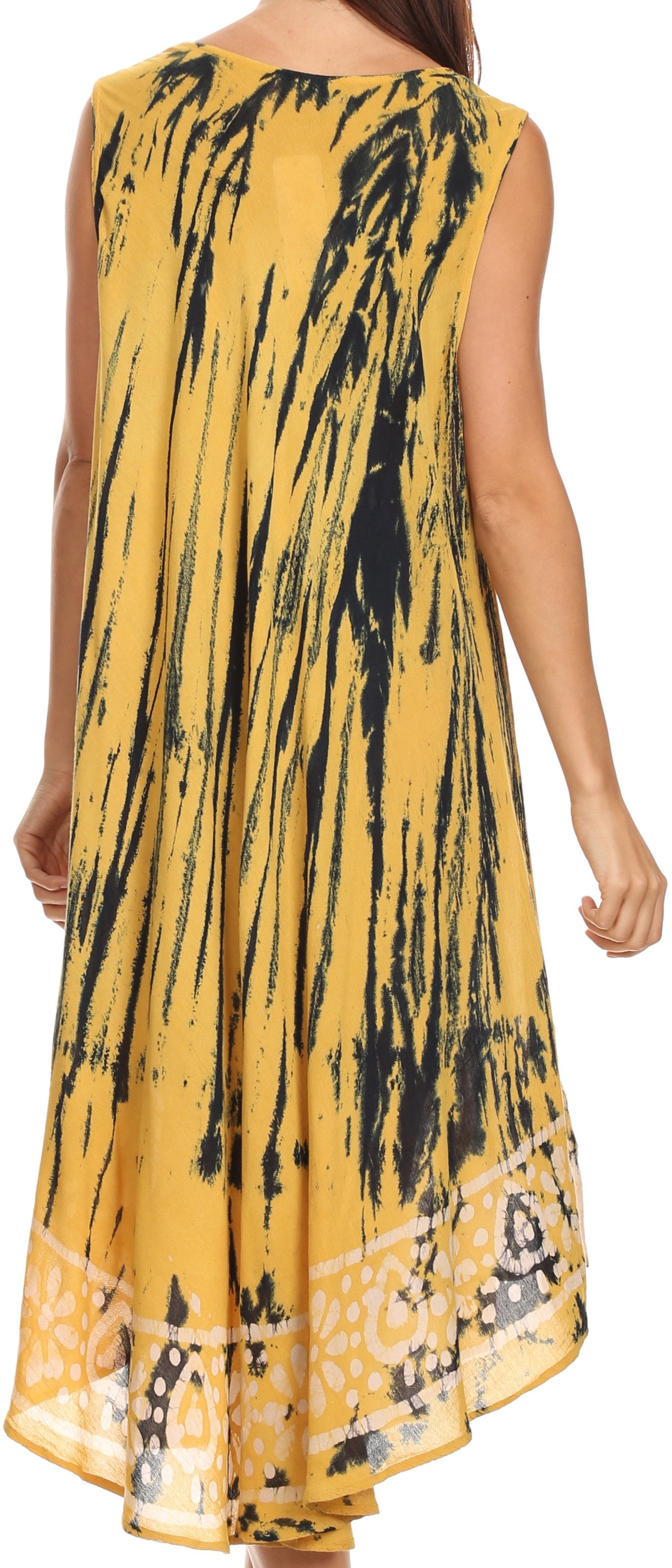 Yellow dress with black abstract pattern worn by a person