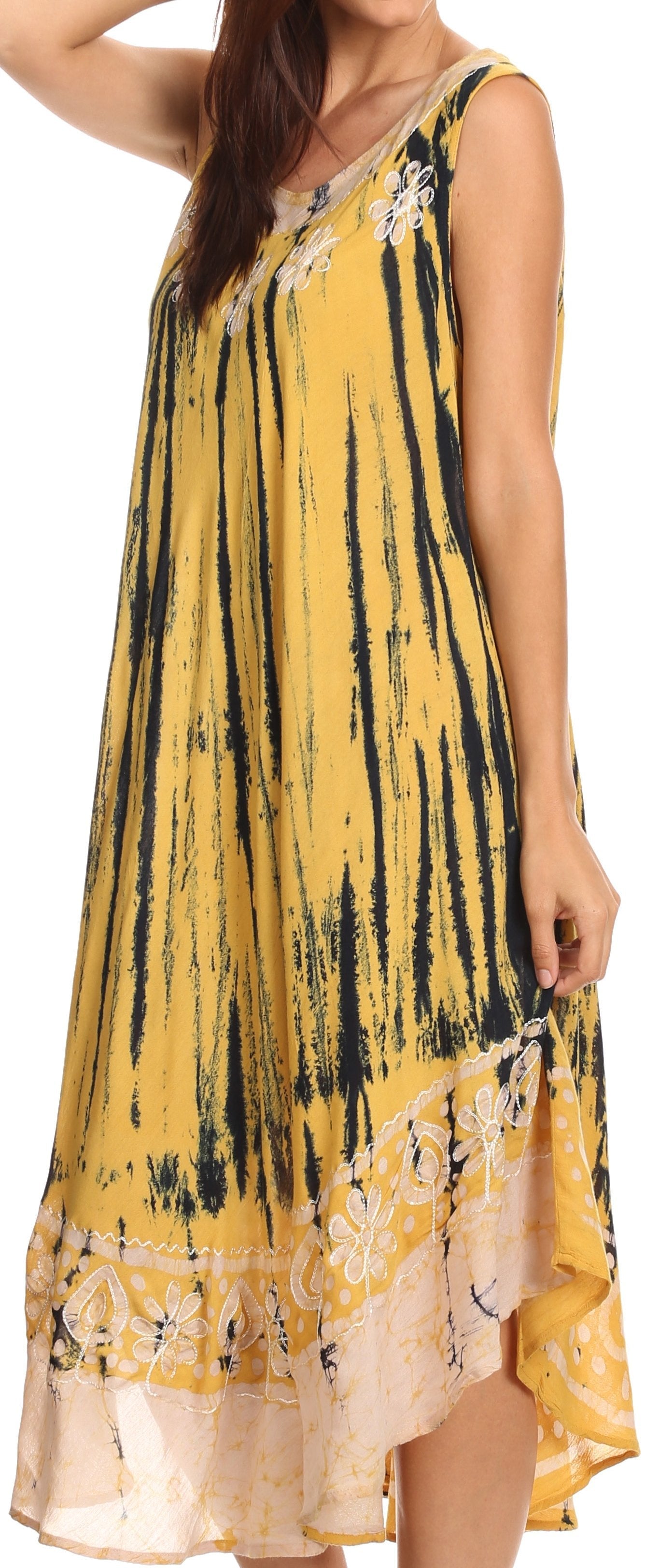 Yellow dress with black abstract pattern on a white background