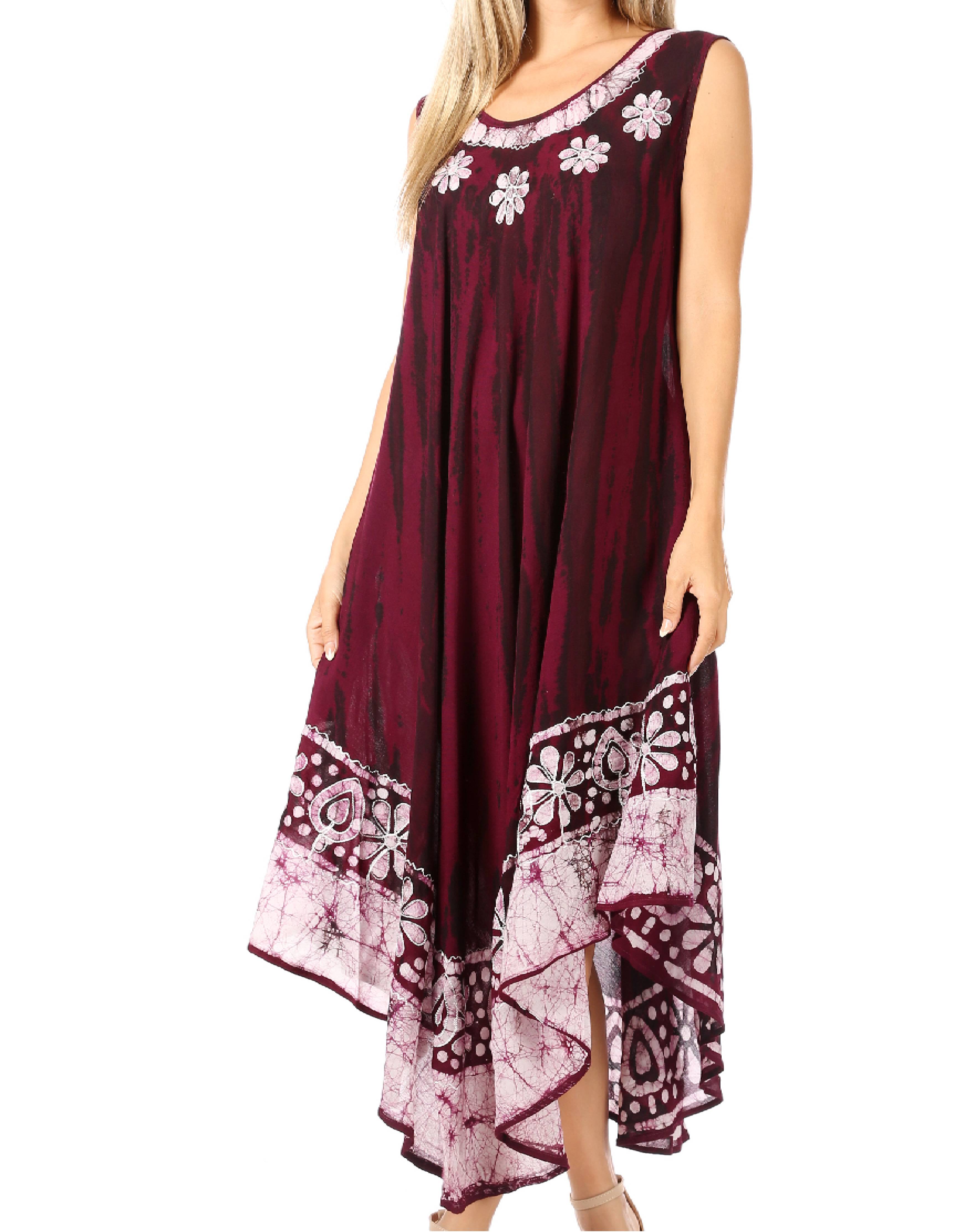 Woman wearing a burgundy dress with floral patterns on a white background