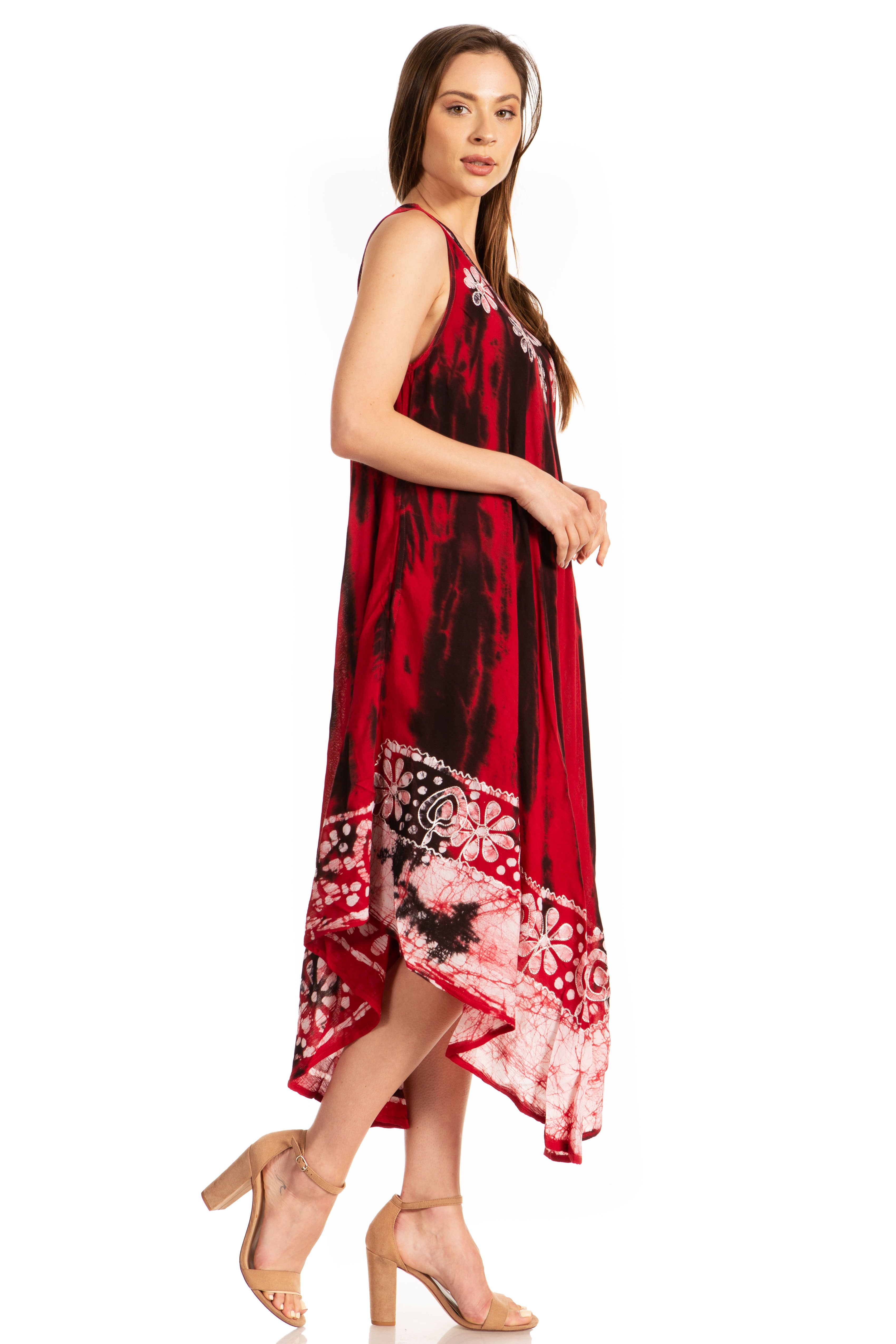Woman wearing a red dress with black patterns on a white background