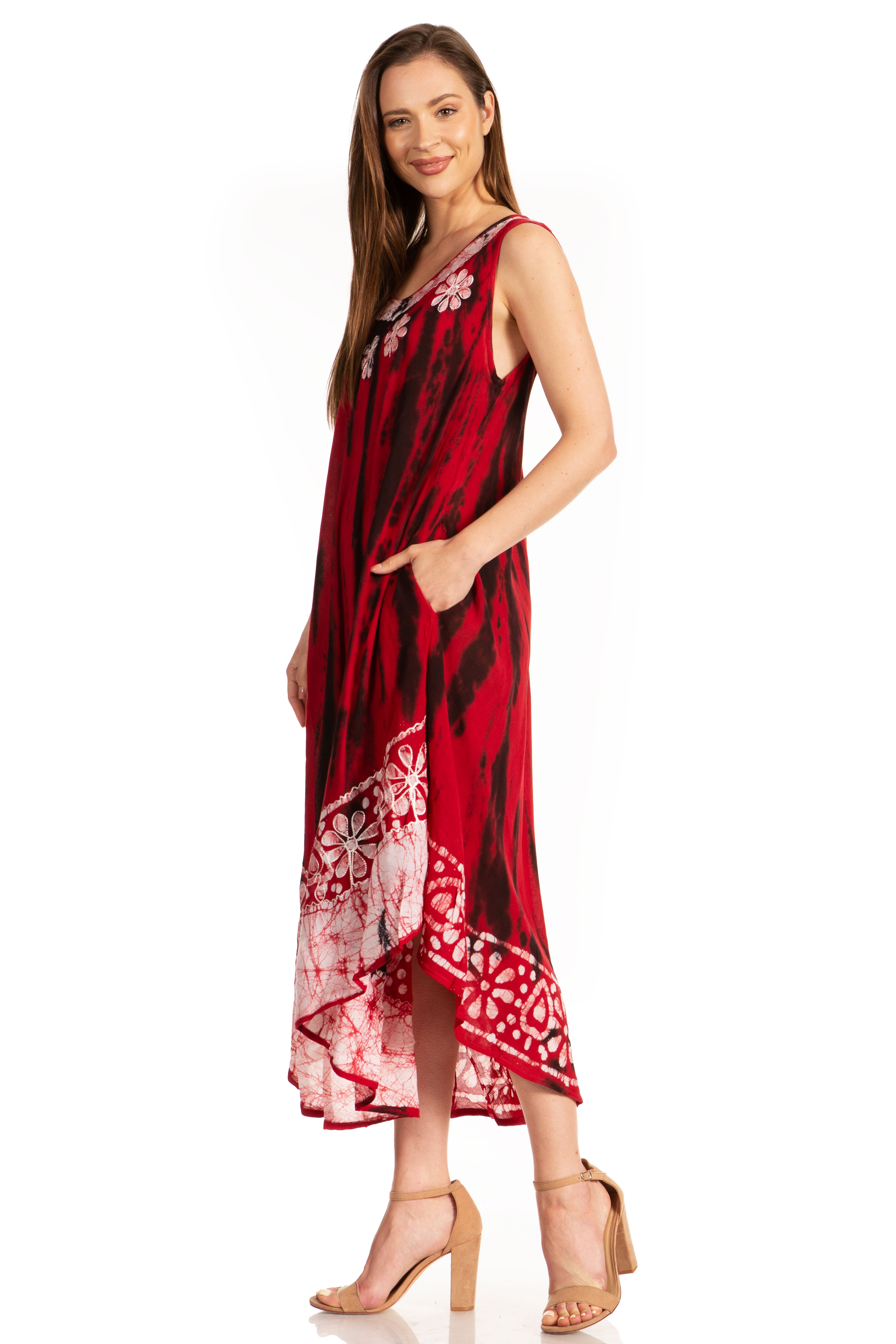 Woman wearing a red and black patterned dress on a white background