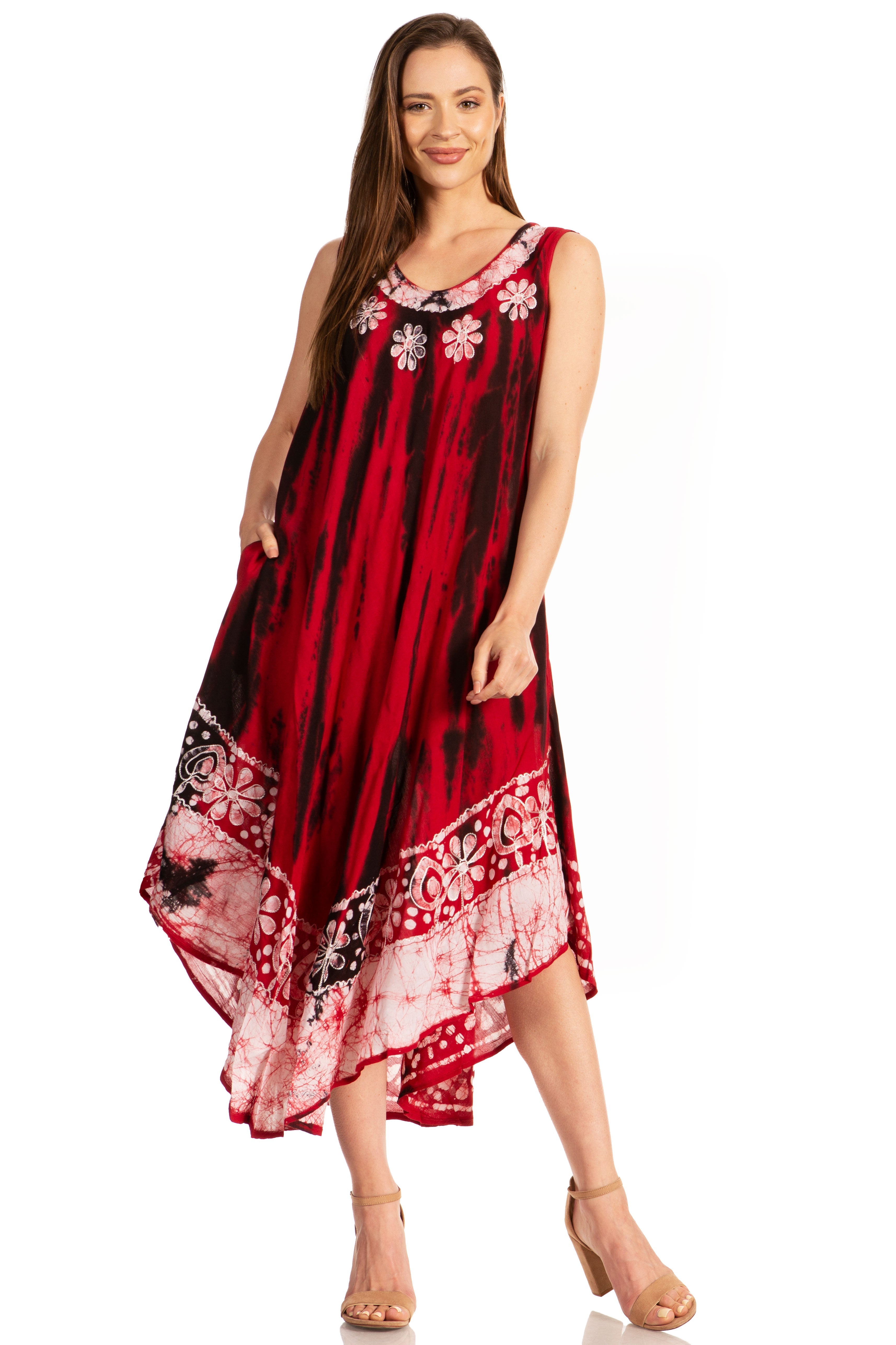 Woman wearing a red and black patterned dress on a white background