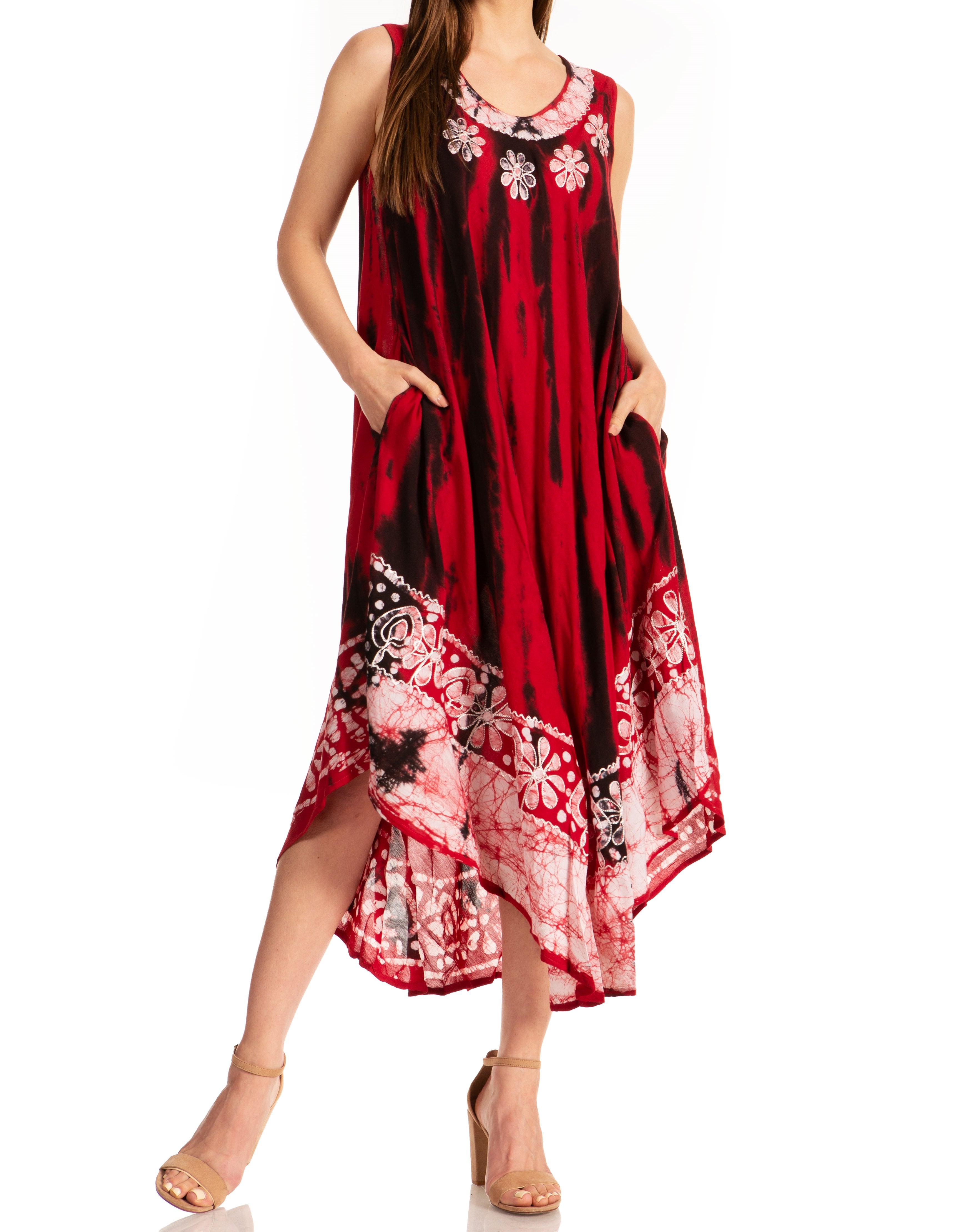 Red and black patterned dress worn by a model on a white background