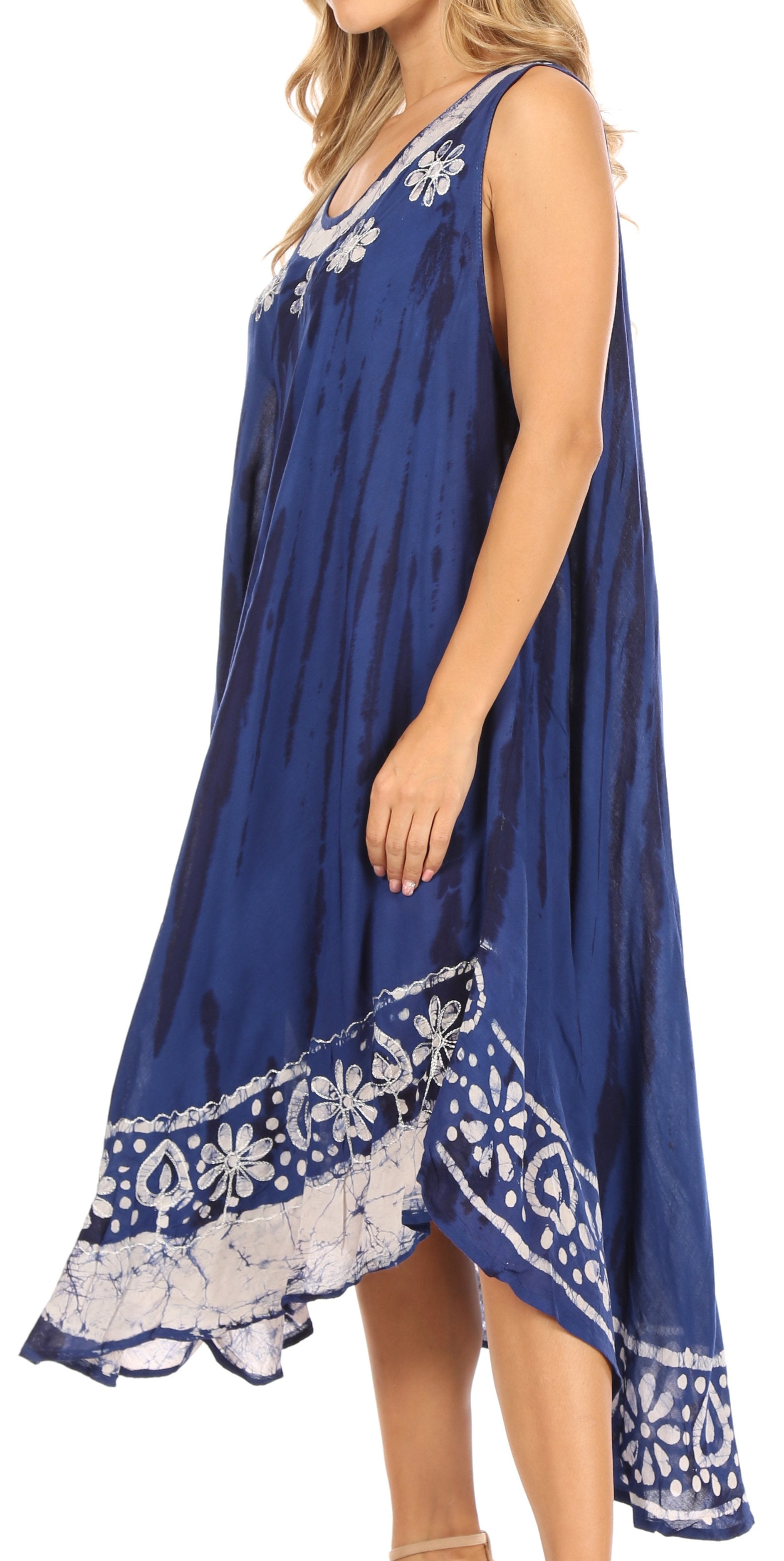 Blue dress with white lace details on a white background