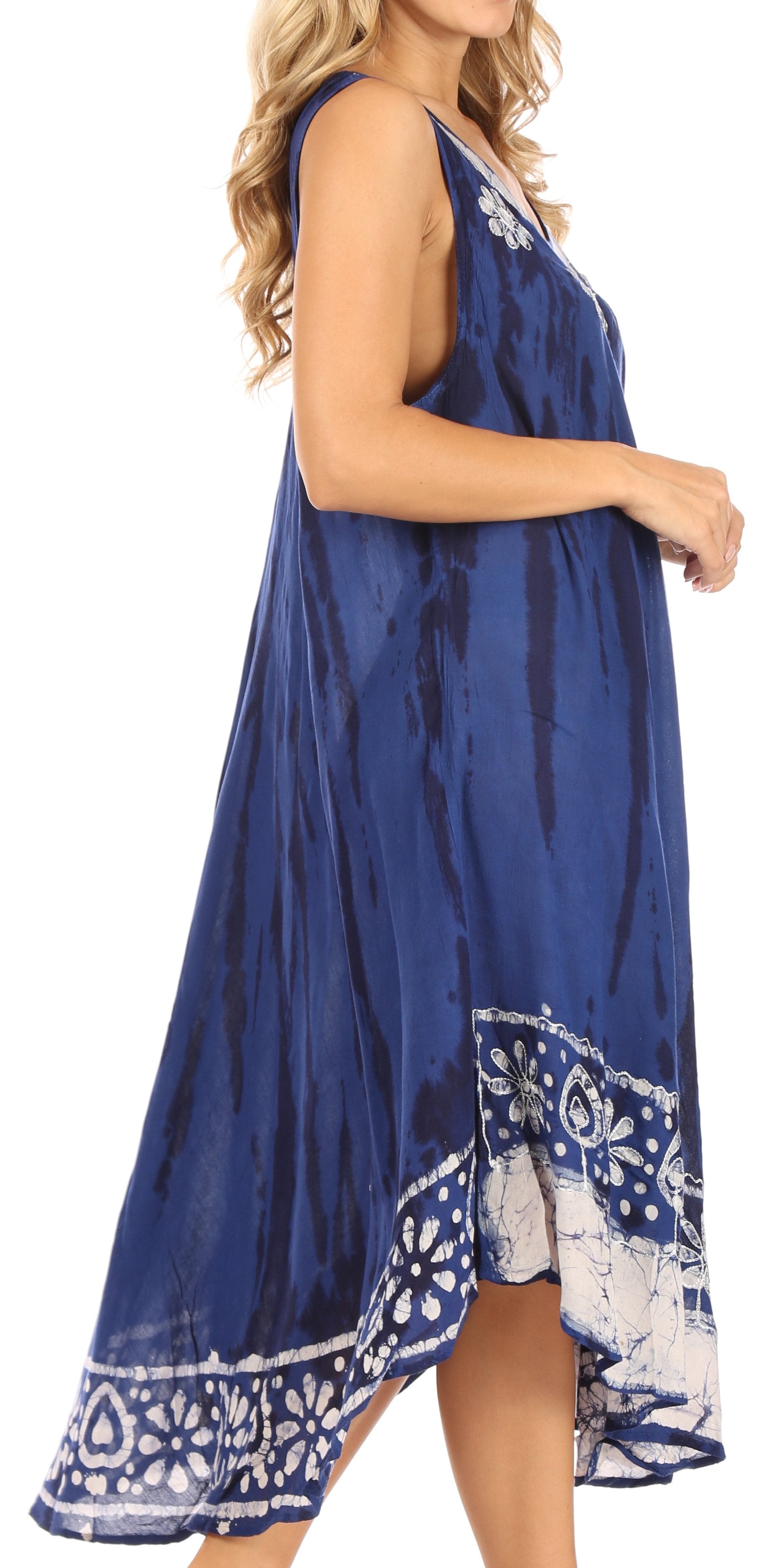 Woman wearing a blue patterned dress on a white background