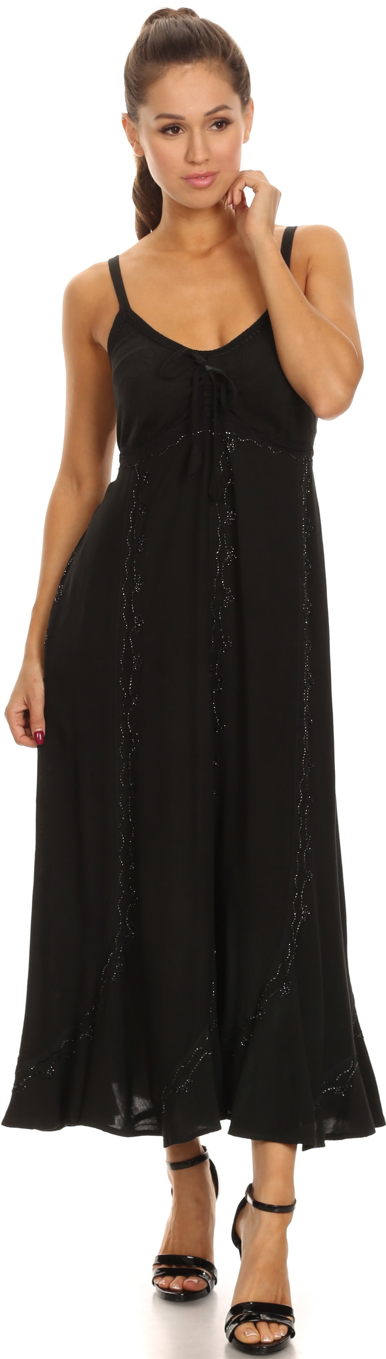 Woman wearing a black sleeveless dress on a white background