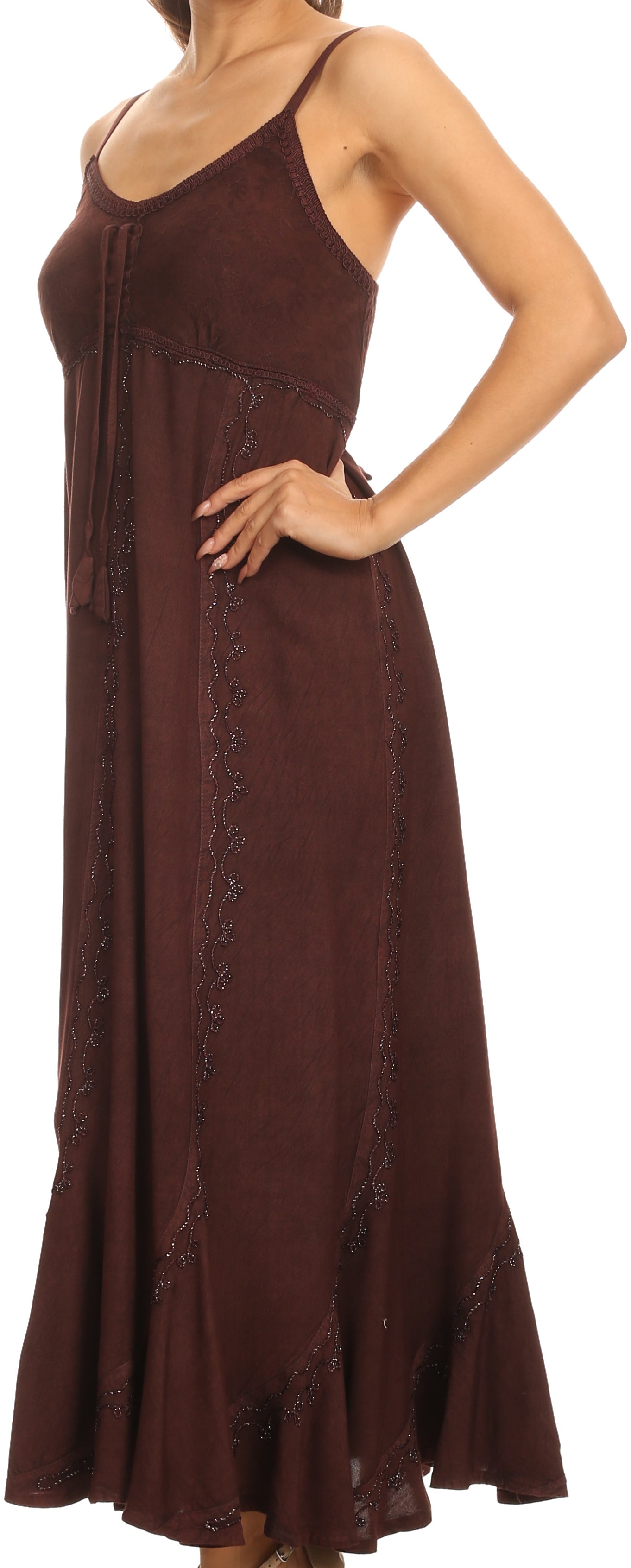 Brown maxi dress worn by a person, with a focus on the garment.