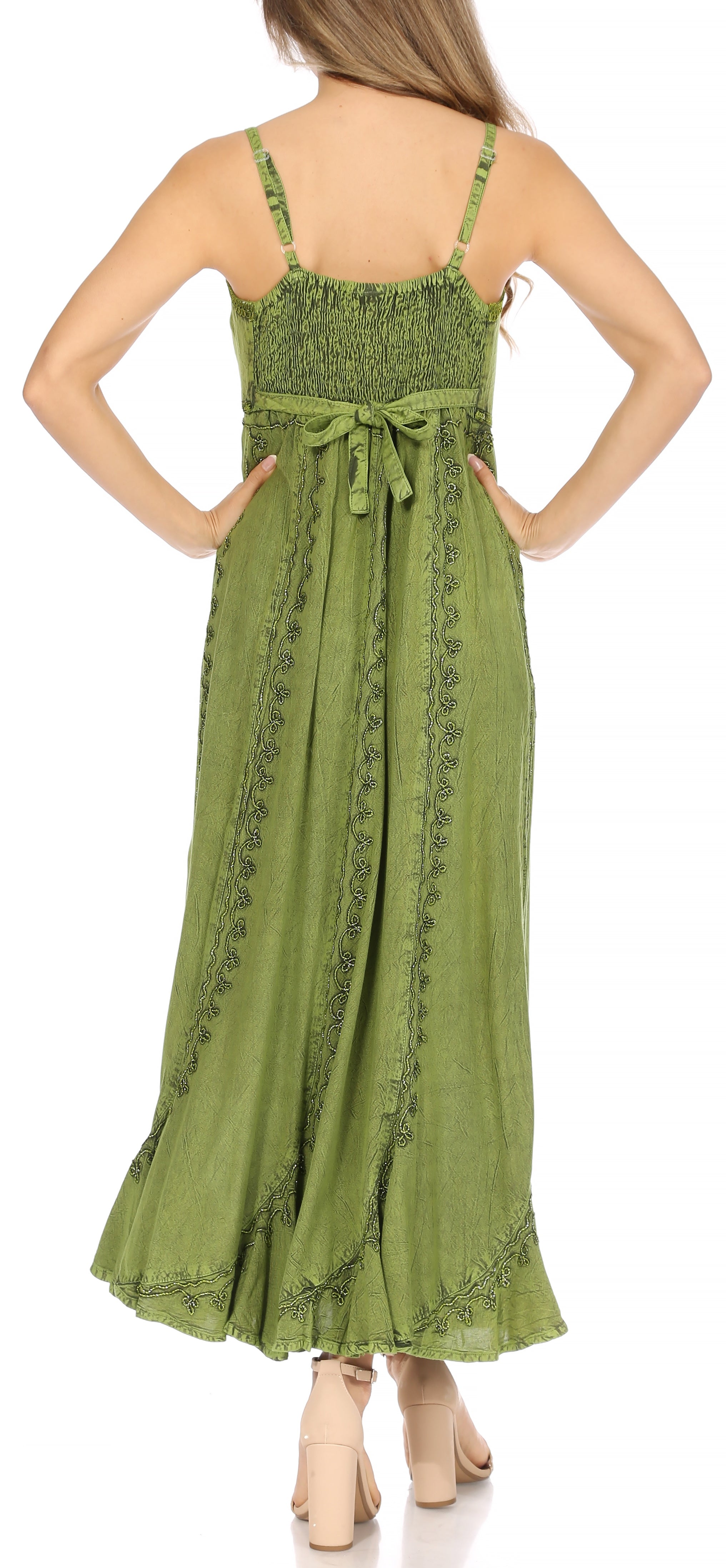 Green dress with lace details on a white background