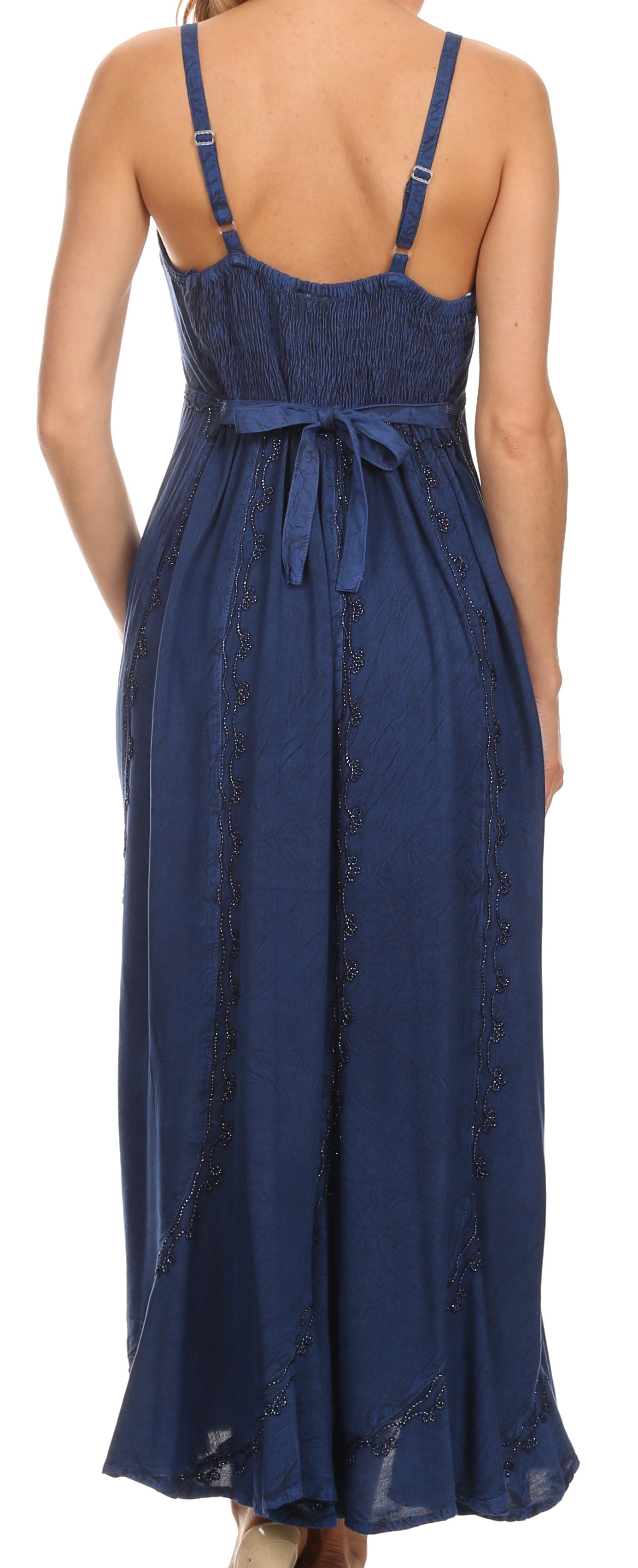 Navy blue dress with thin straps and a belt on a white background