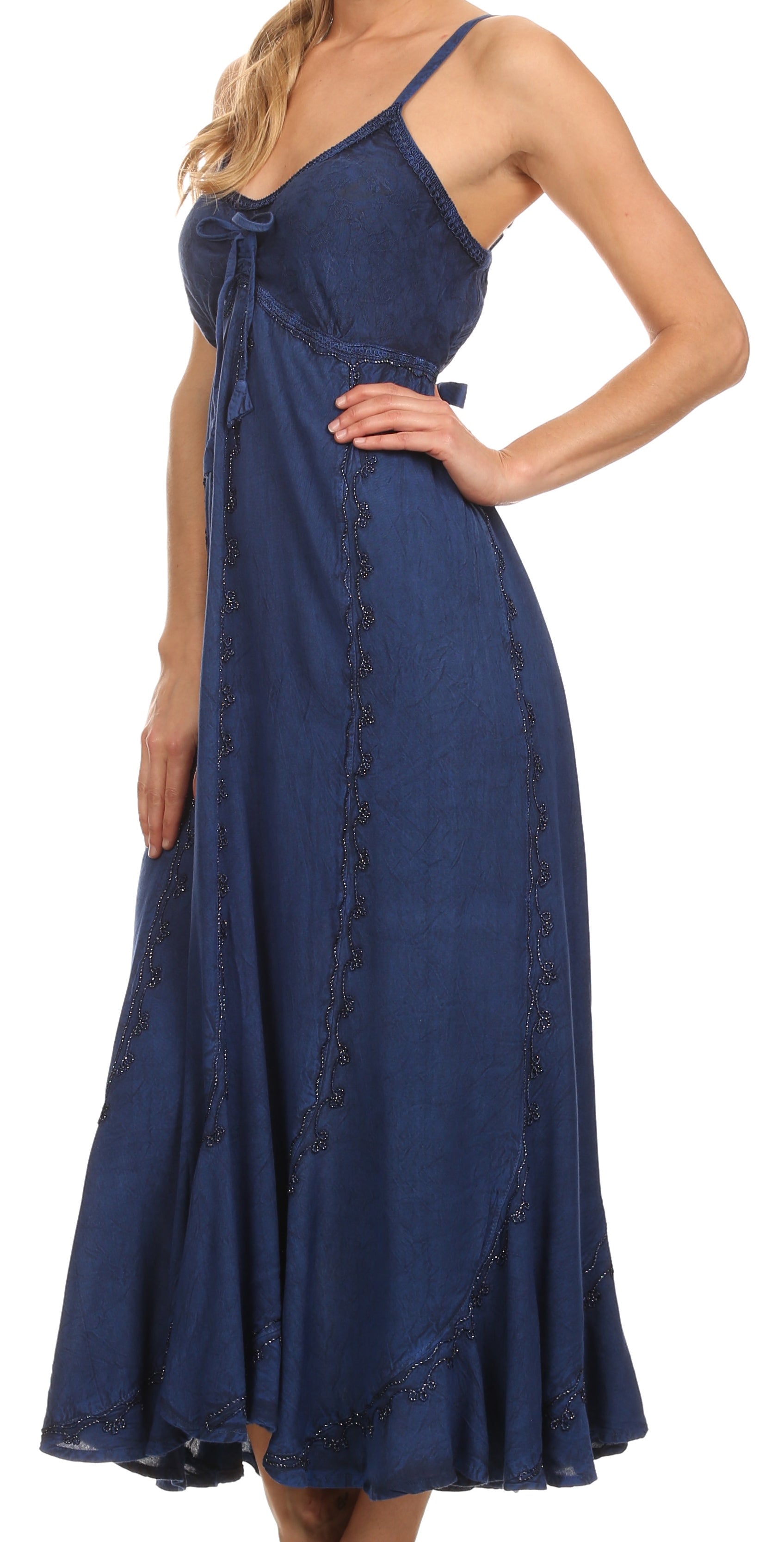 Navy blue dress with lace details on a white background
