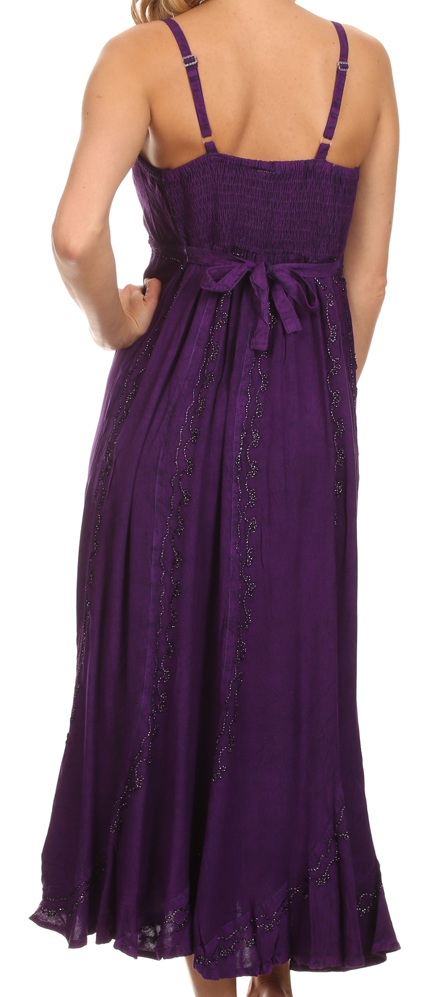 Purple dress with lace details on a white background