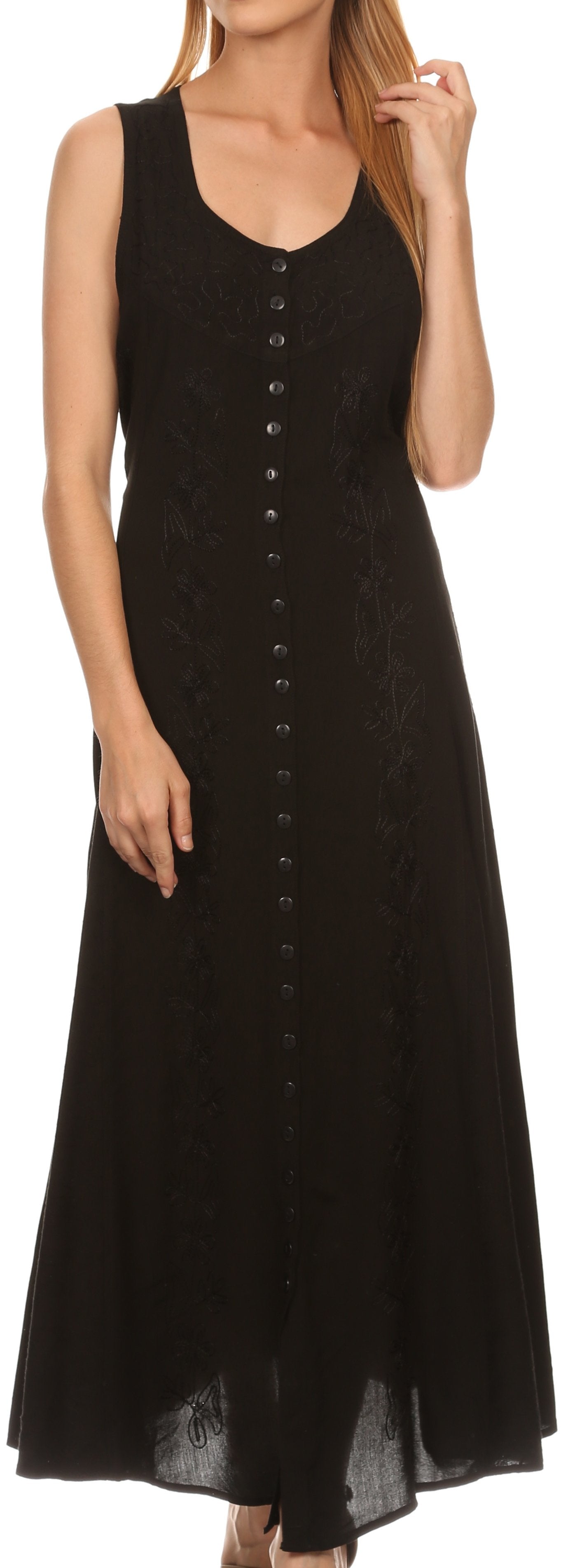 Woman wearing a black sleeveless dress with buttons down the front on a white background