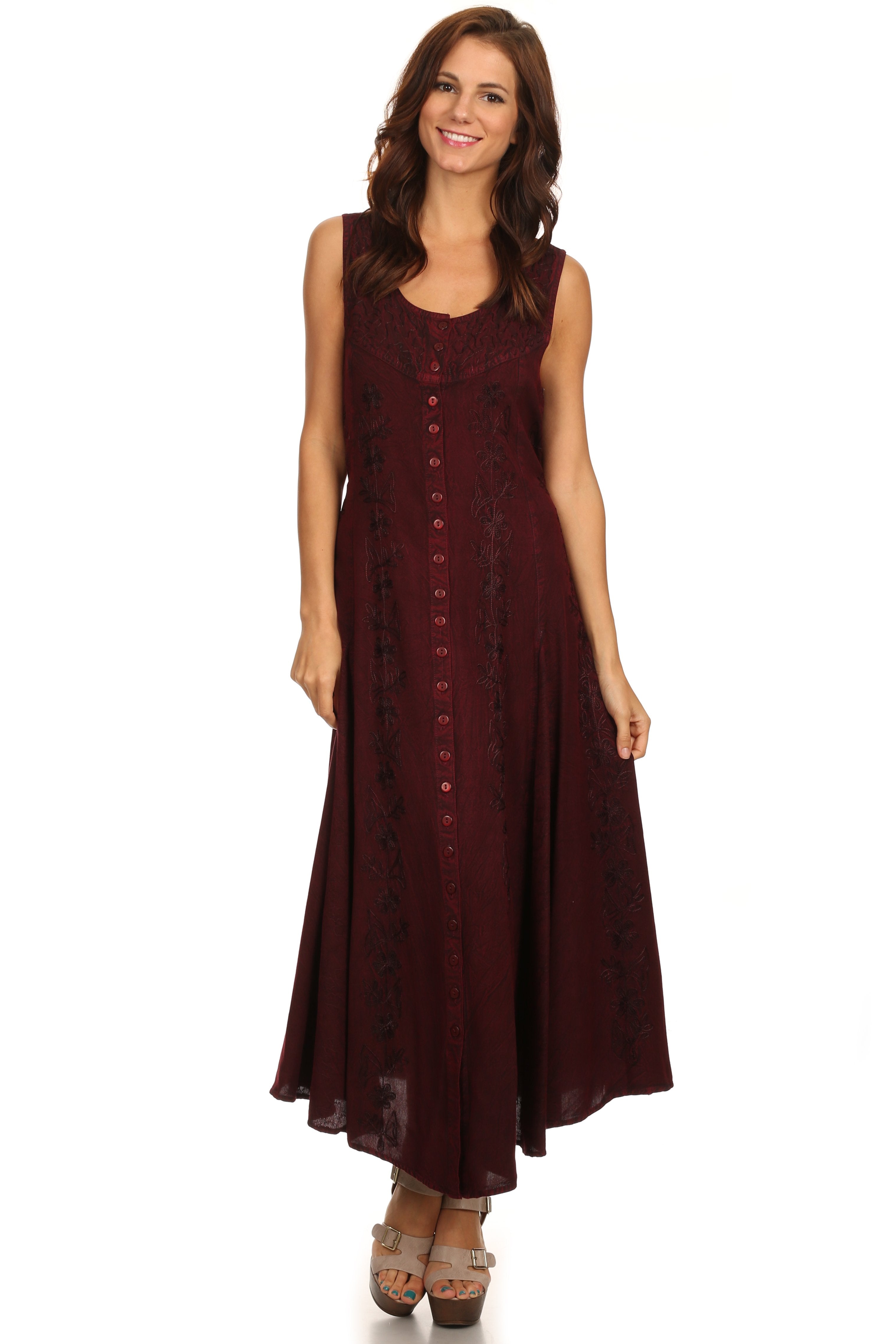 Woman wearing a burgundy dress on a white background