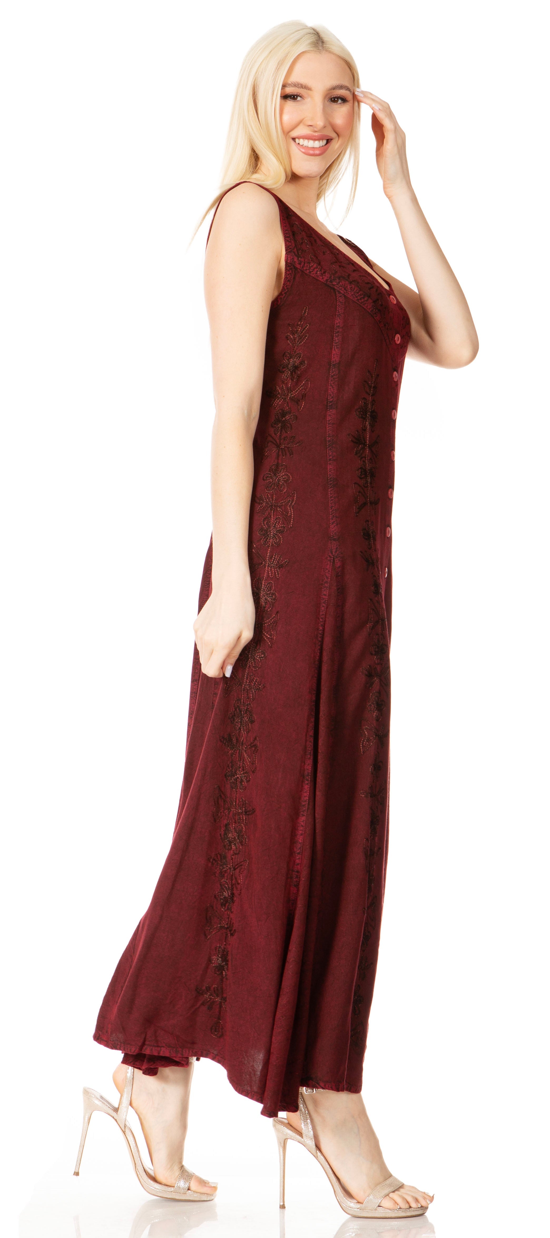 Woman wearing a burgundy dress on a white background