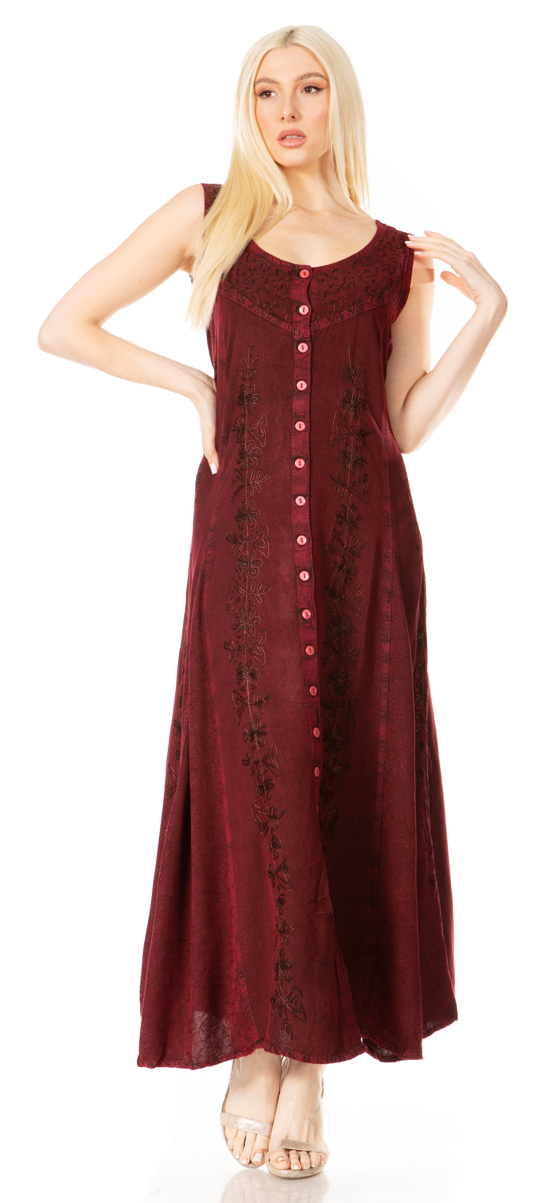 Woman wearing a burgundy dress with buttons on a white background