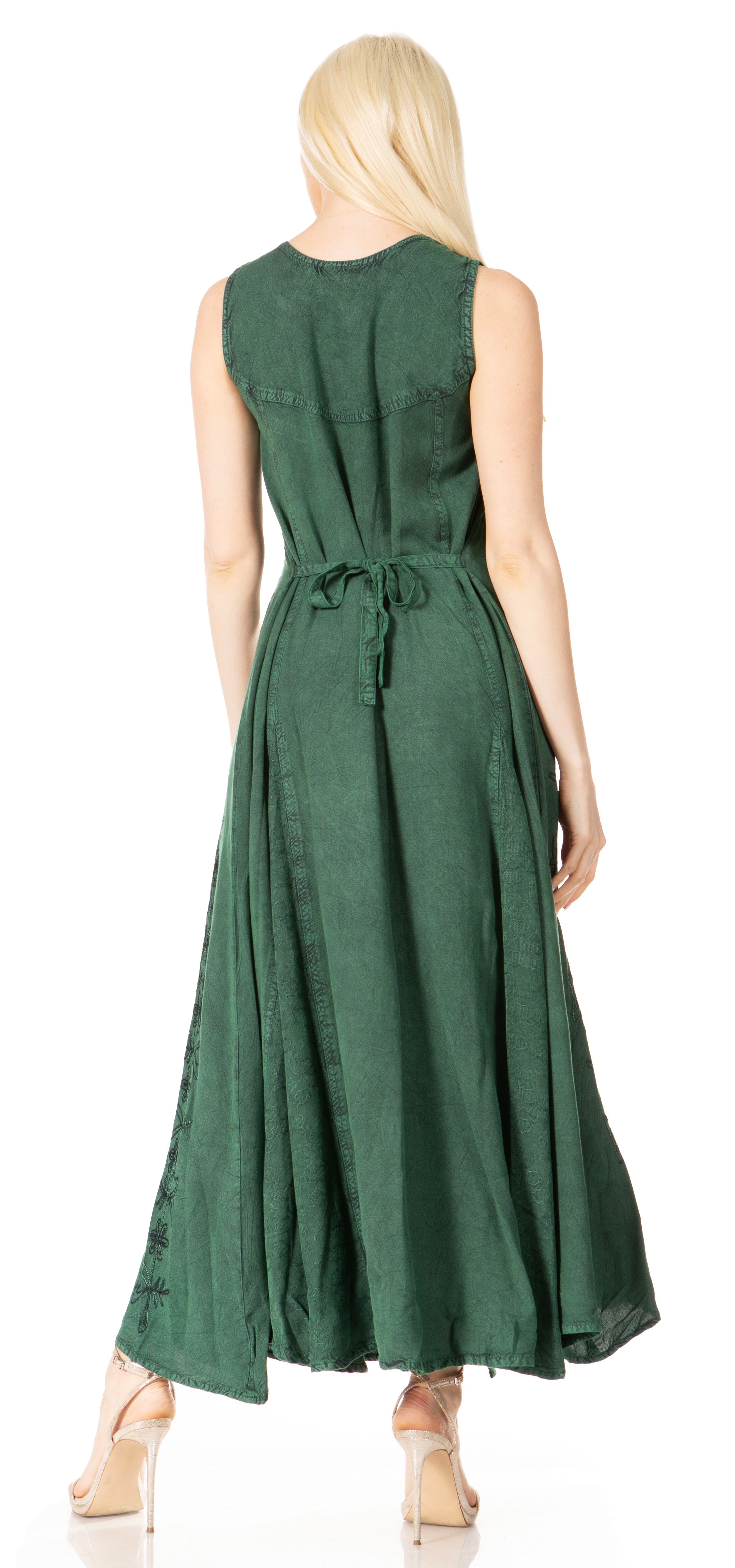 Green dress worn by a model on a white background
