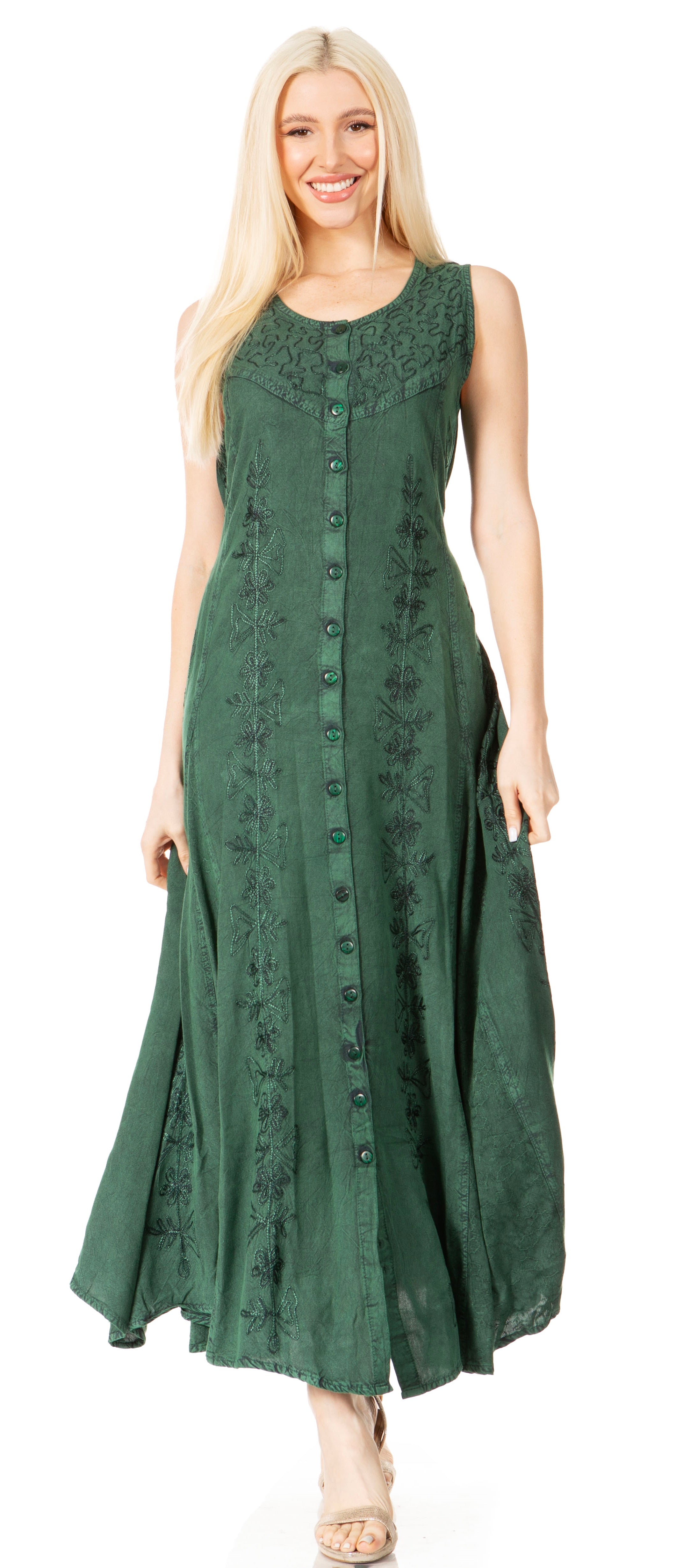 Woman wearing a green dress with lace details on a white background