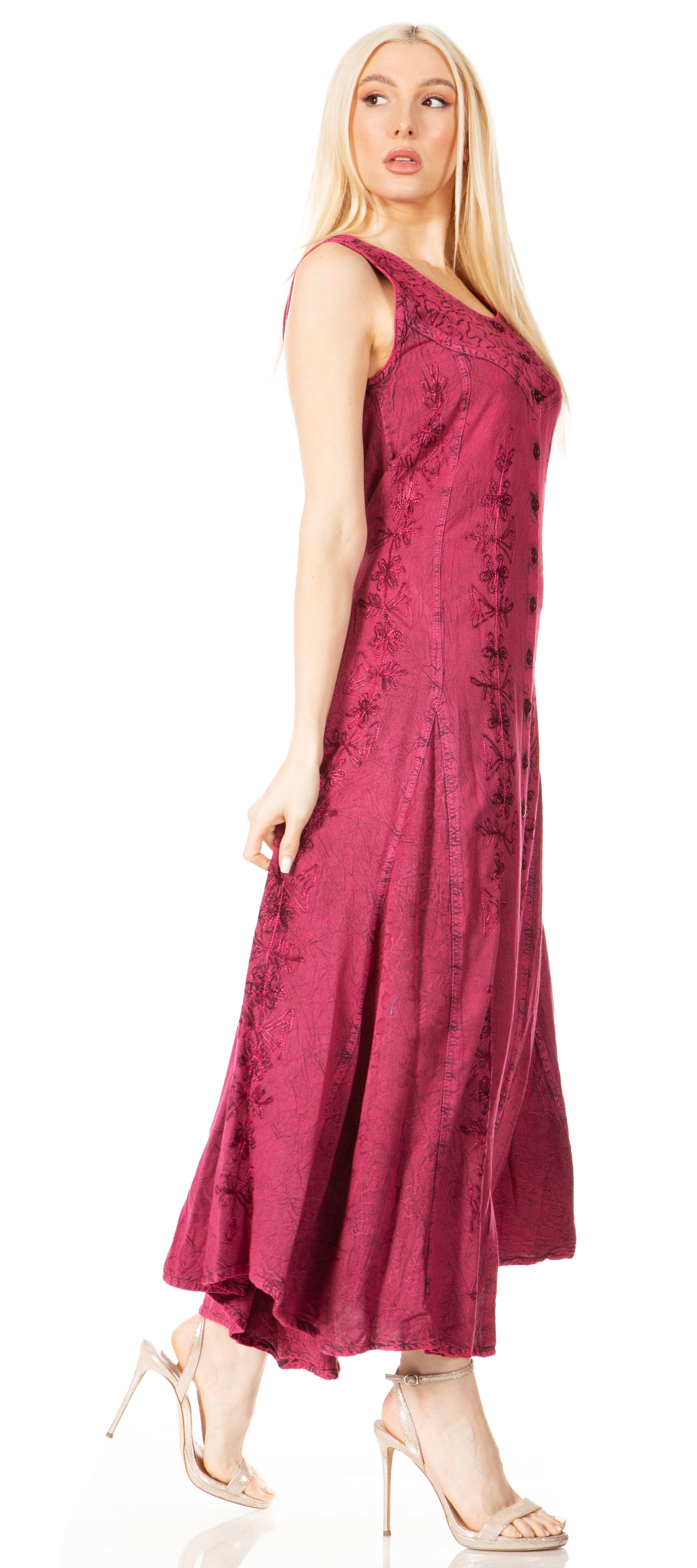 Woman wearing a burgundy sleeveless dress on a white background