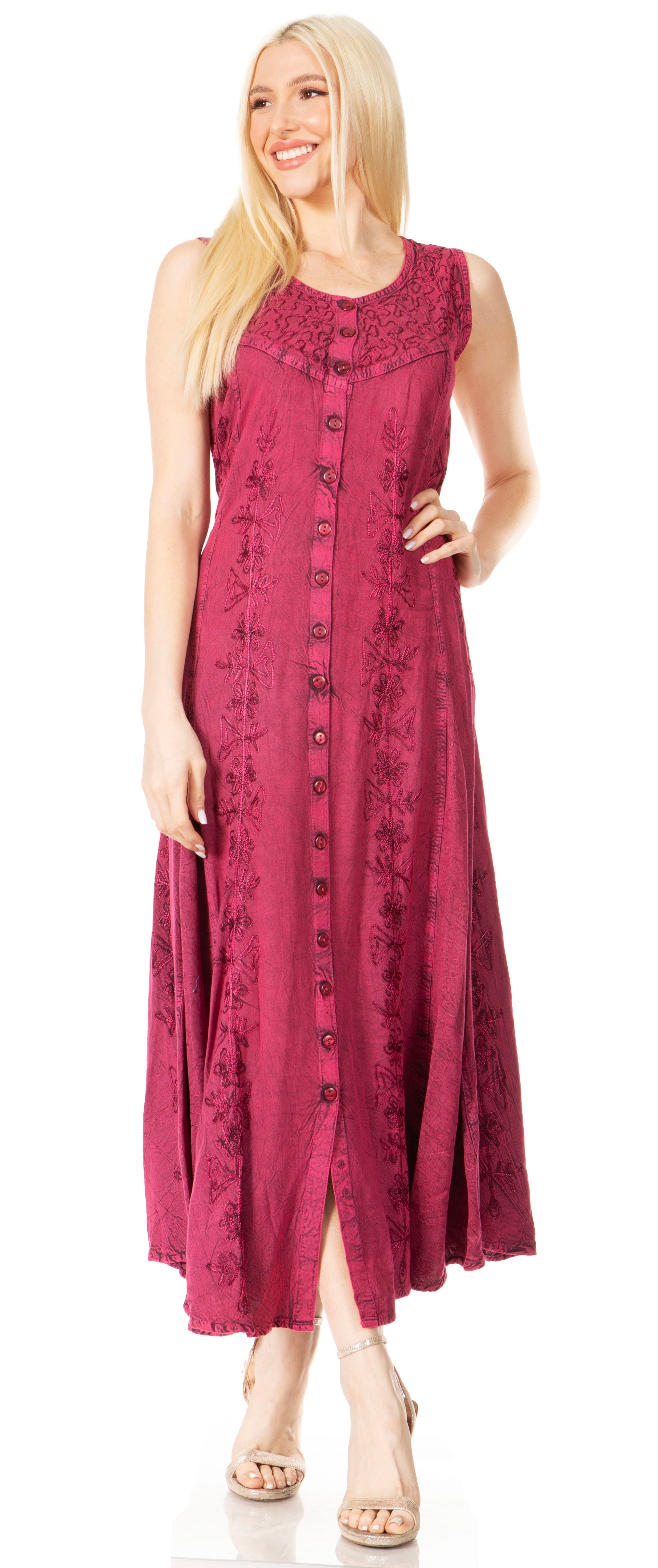 Woman wearing a sleeveless burgundy dress with a floral pattern on a white background