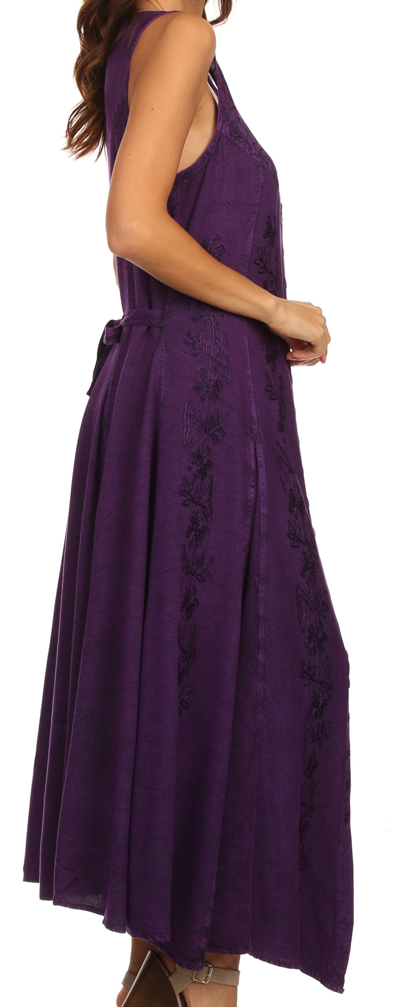 Purple dress with floral embroidery on a white background