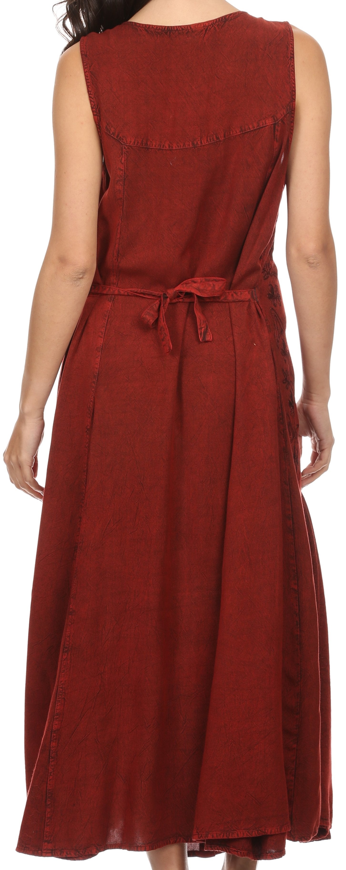 Red sleeveless dress with a belt worn by a person