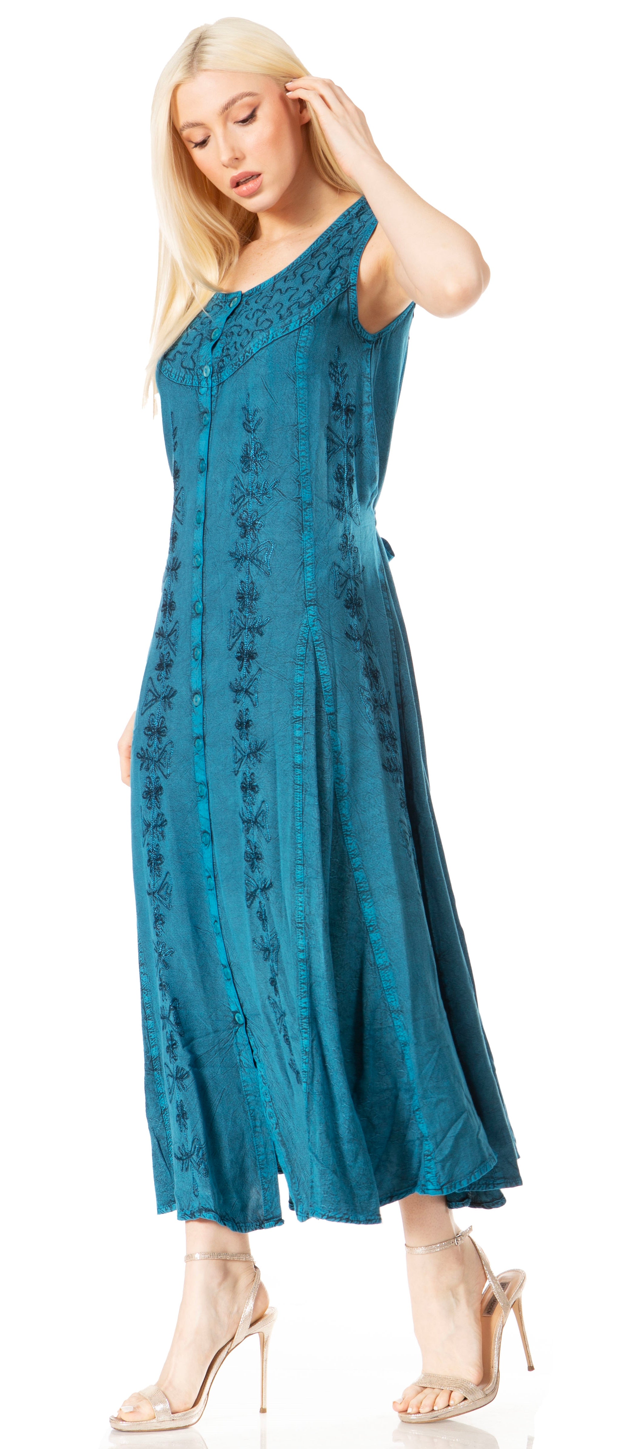 Woman wearing a blue dress against a white background