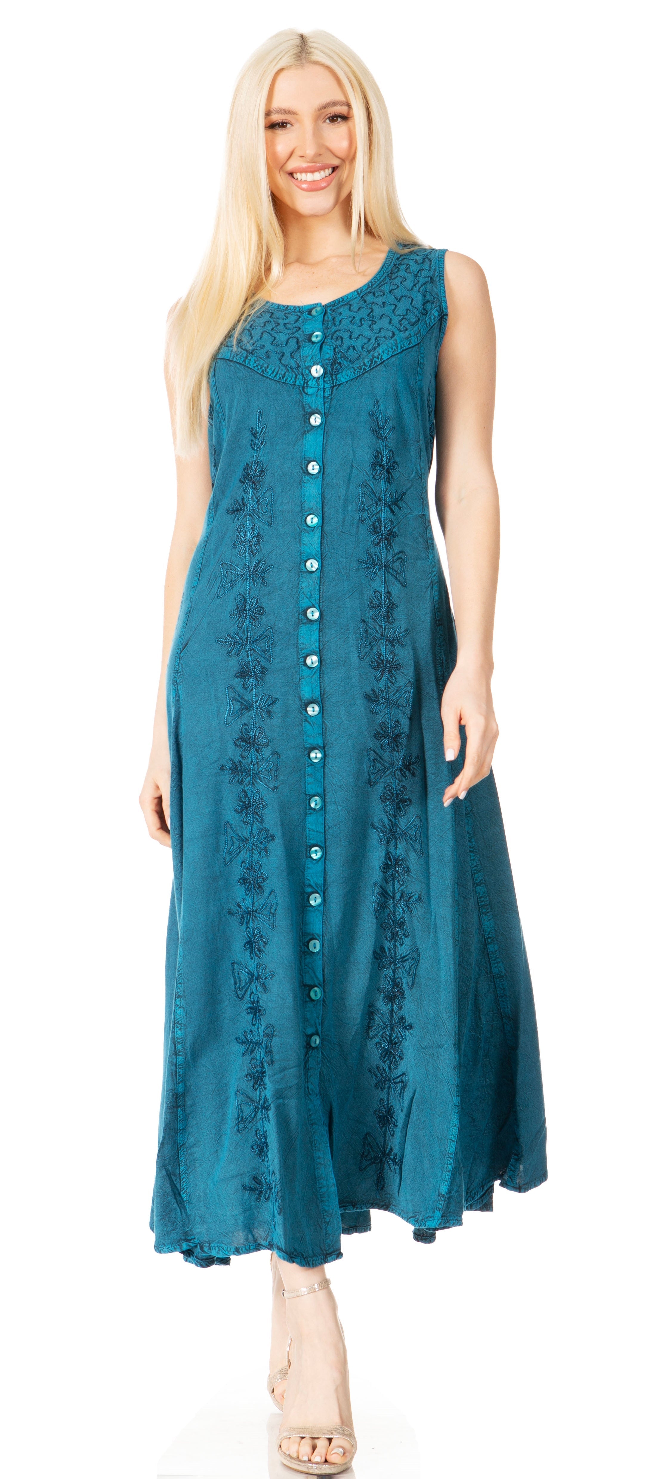 Woman wearing a teal sleeveless dress with button details on a white background
