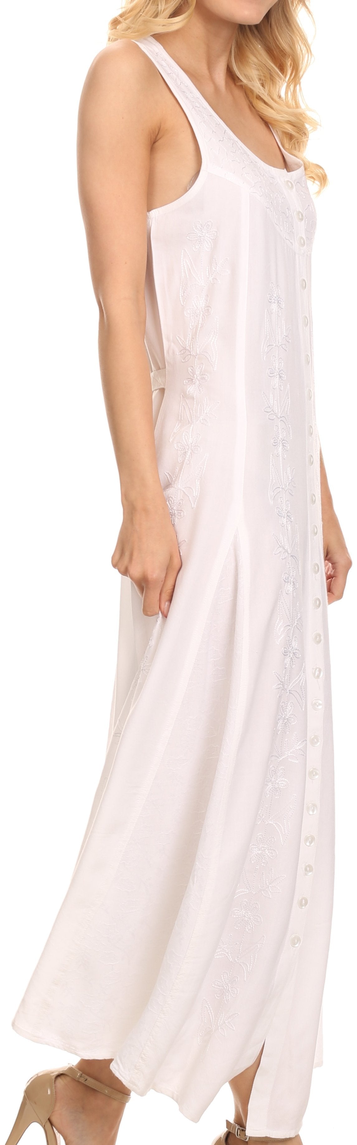 Woman wearing a white sleeveless dress against a white background