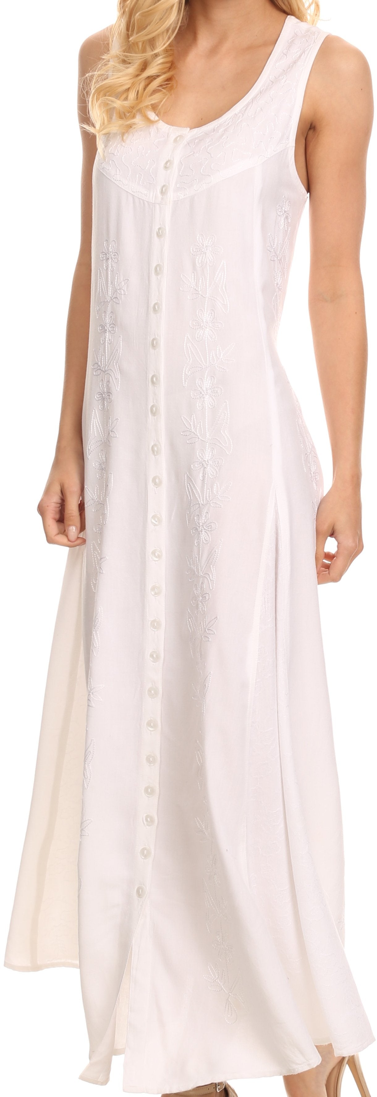 Woman wearing a white sleeveless dress against a neutral background