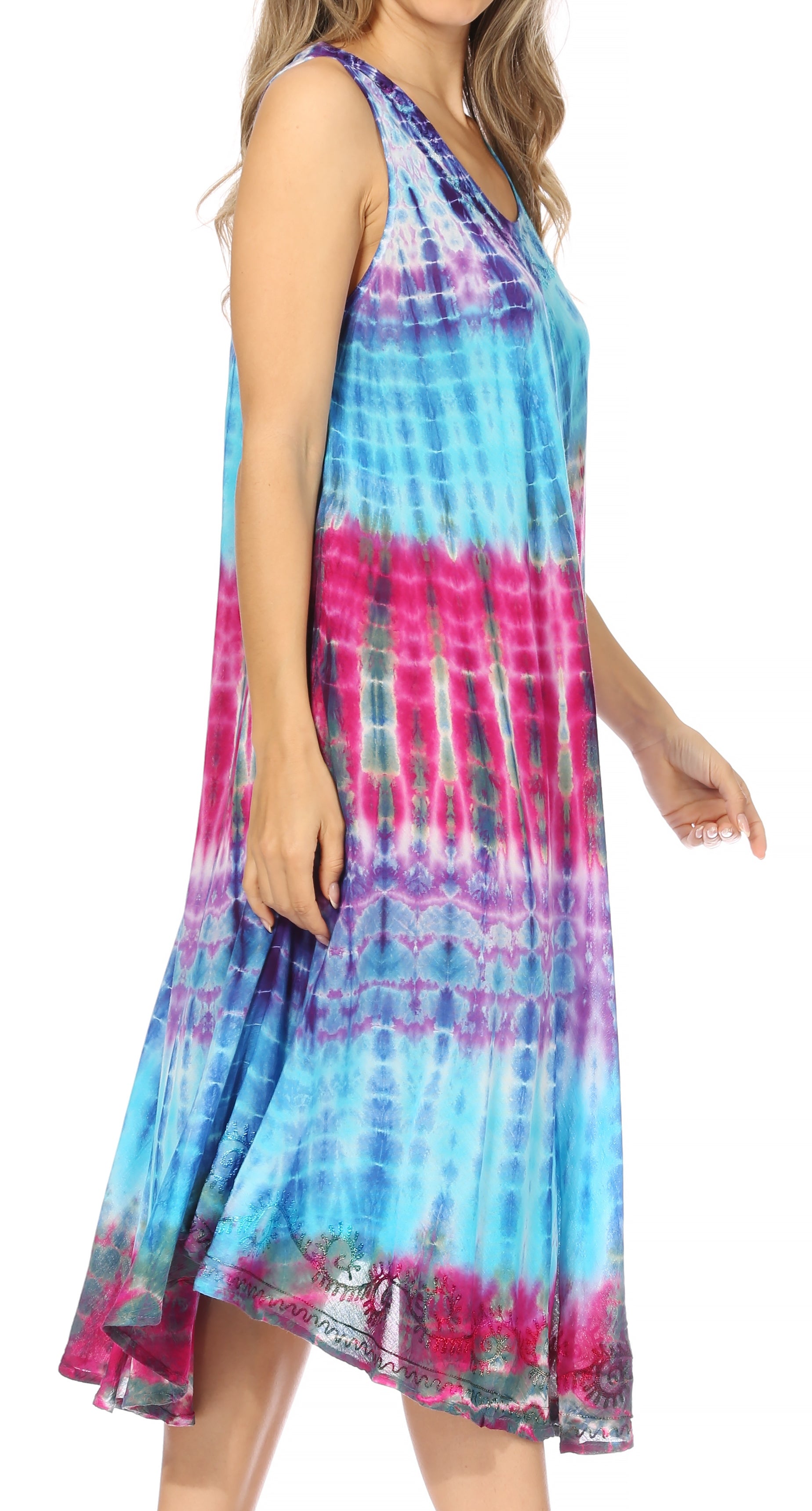 Multicolored tie-dye dress worn by a person on a white background