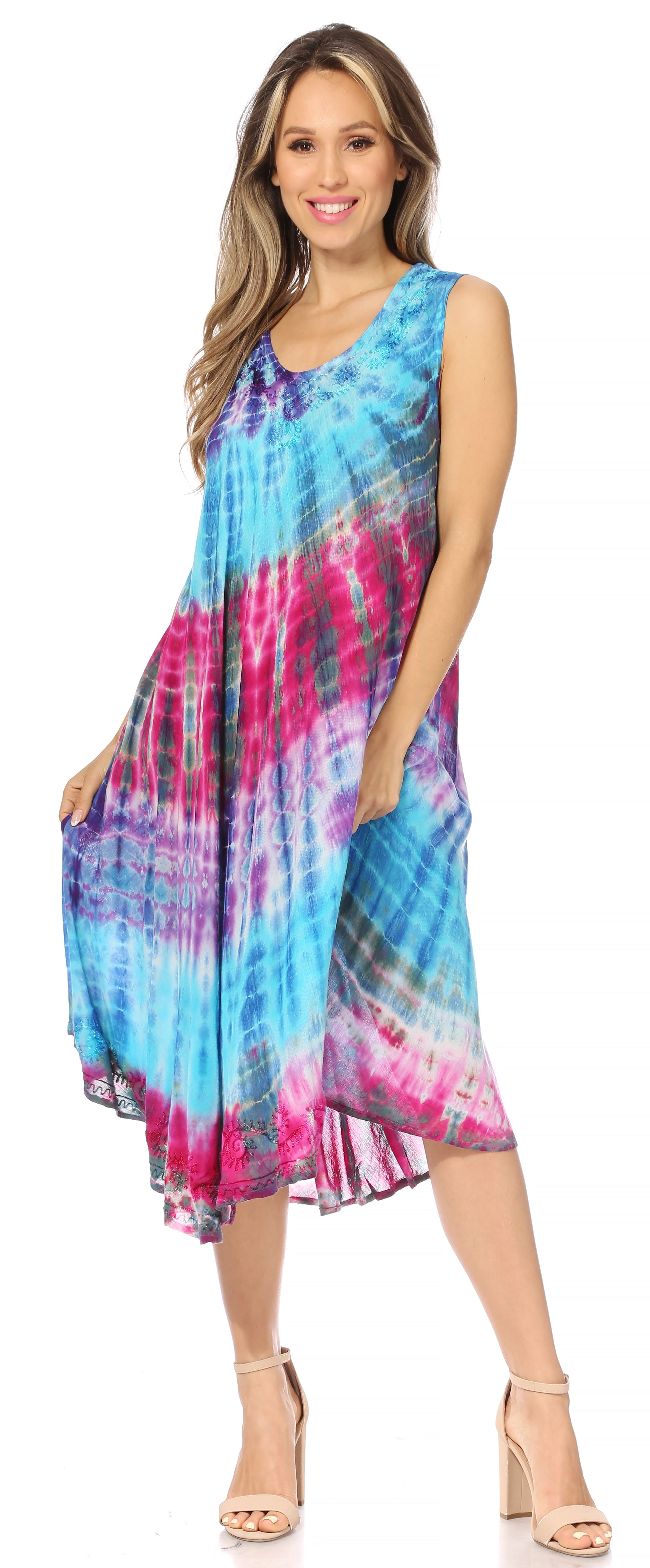 Woman wearing a colorful tie-dye dress on a white background