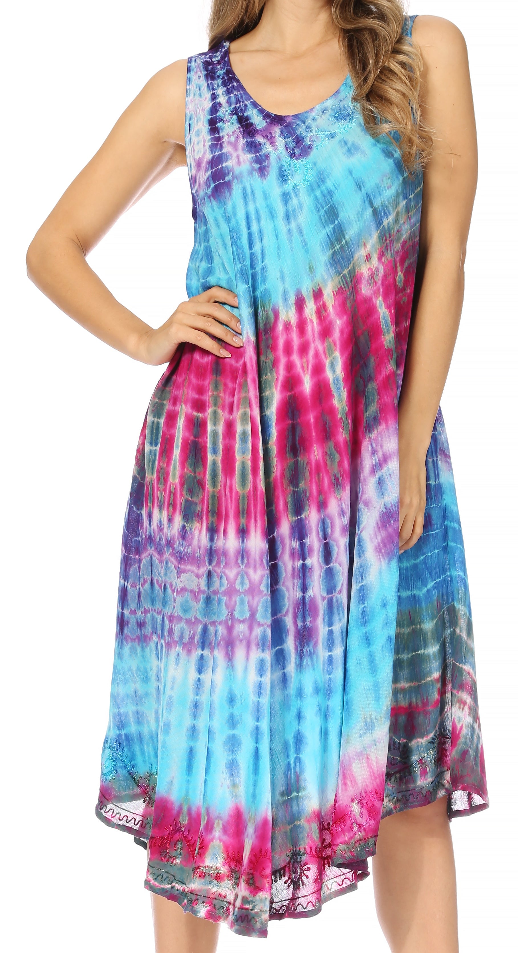 Woman wearing a tie-dye dress with blue, pink, and green patterns on a white background