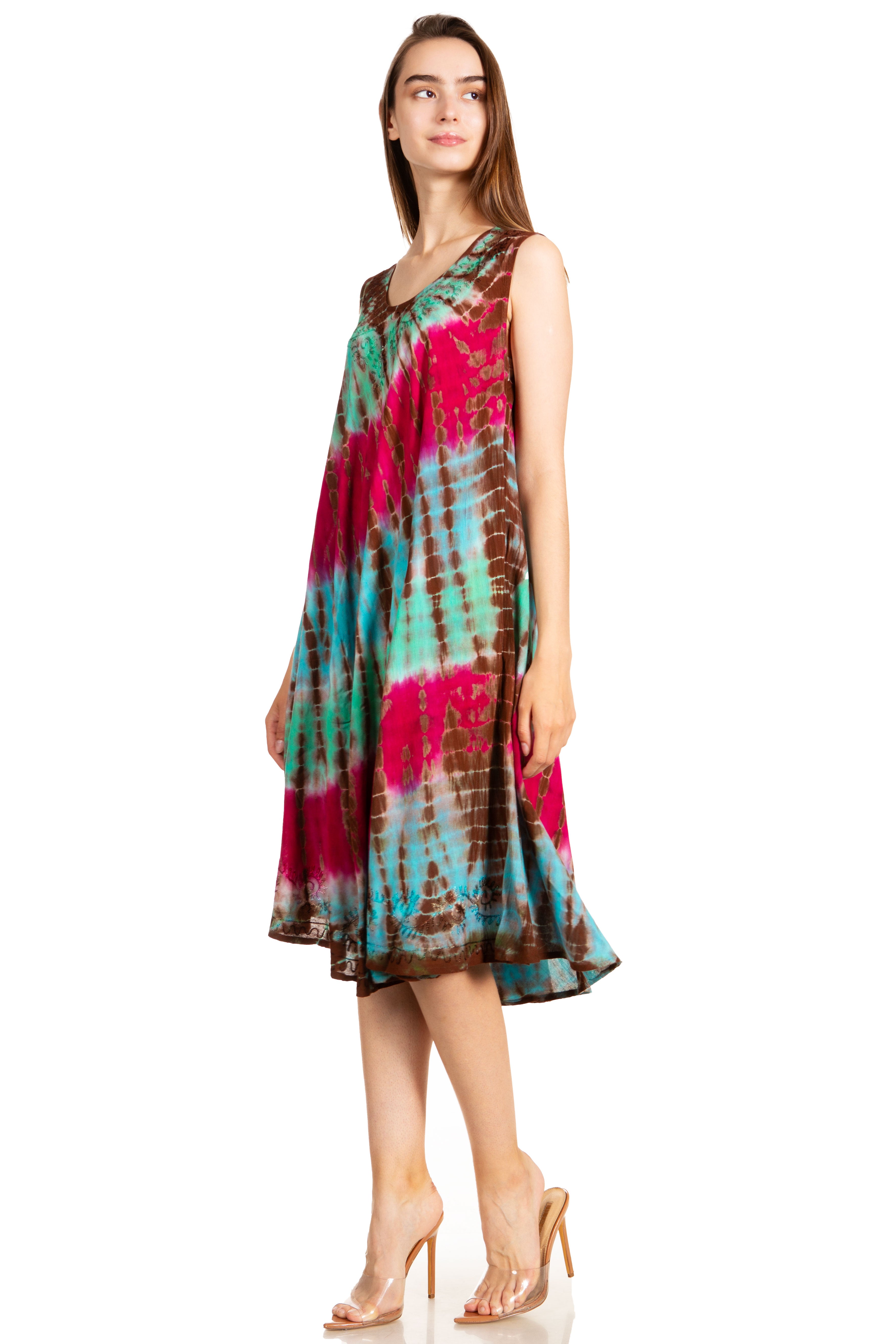 Woman wearing a colorful tie-dye dress on a white background
