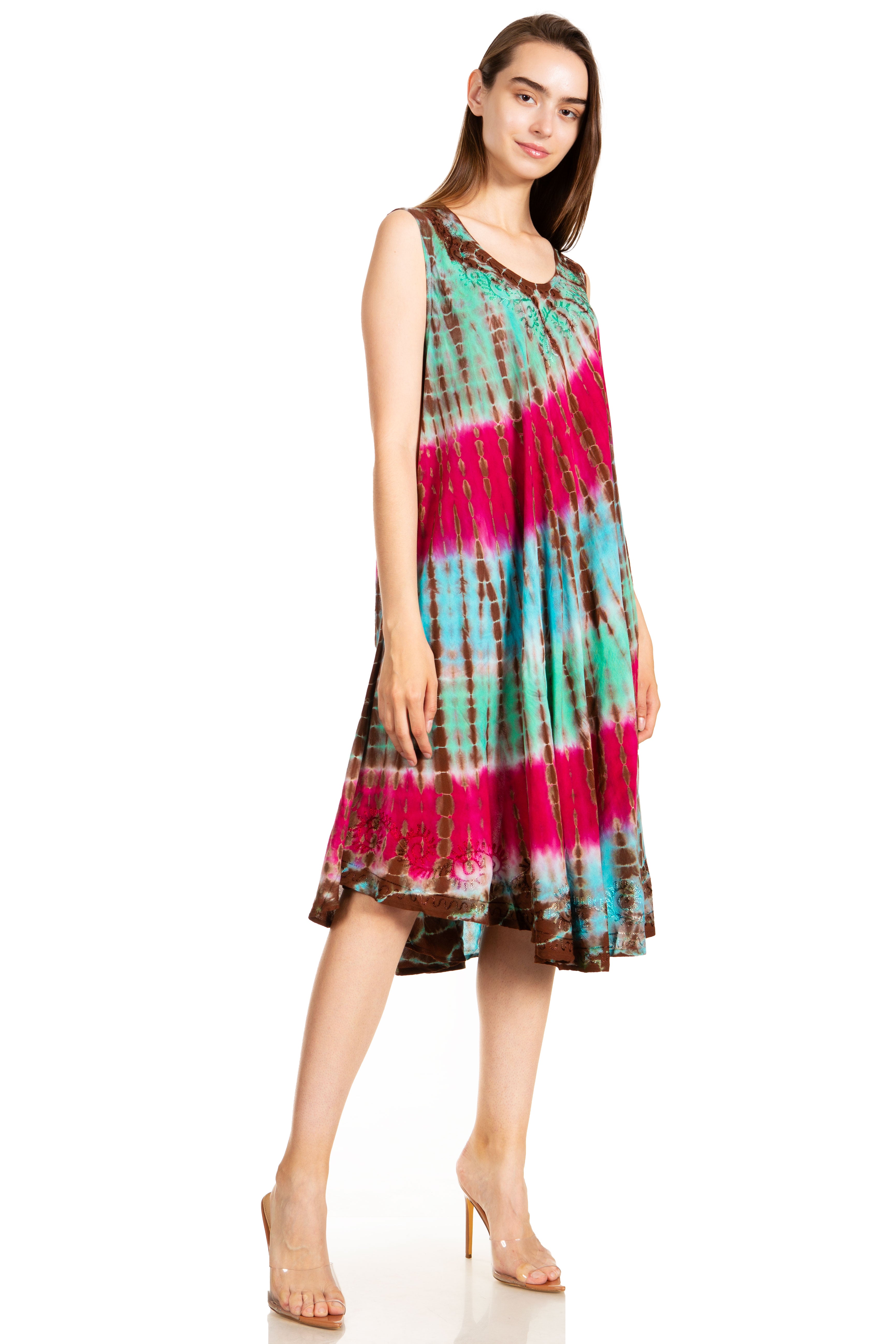 Woman wearing a tie-dye dress on a white background