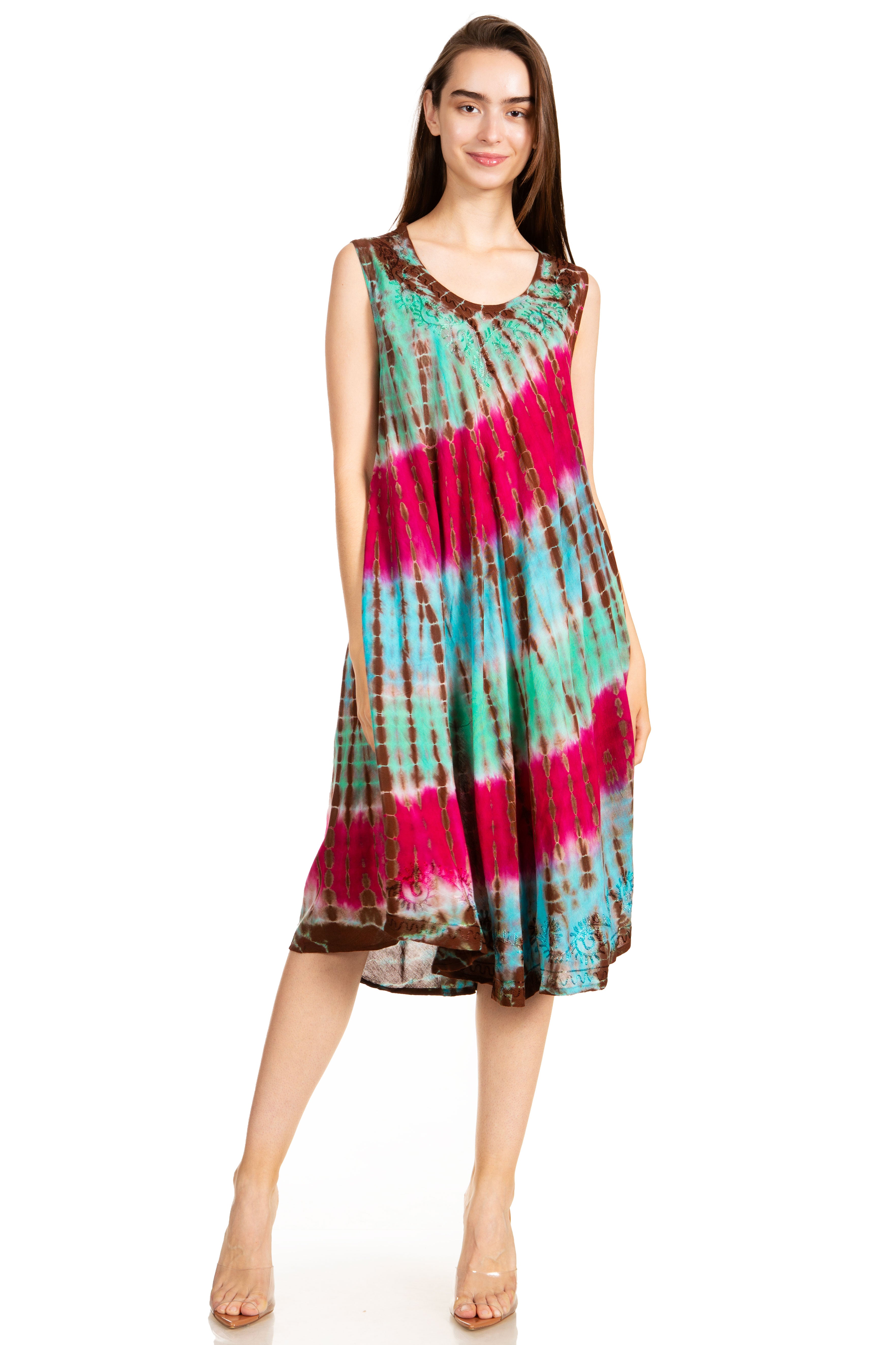 Woman wearing a tie-dye dress on a white background