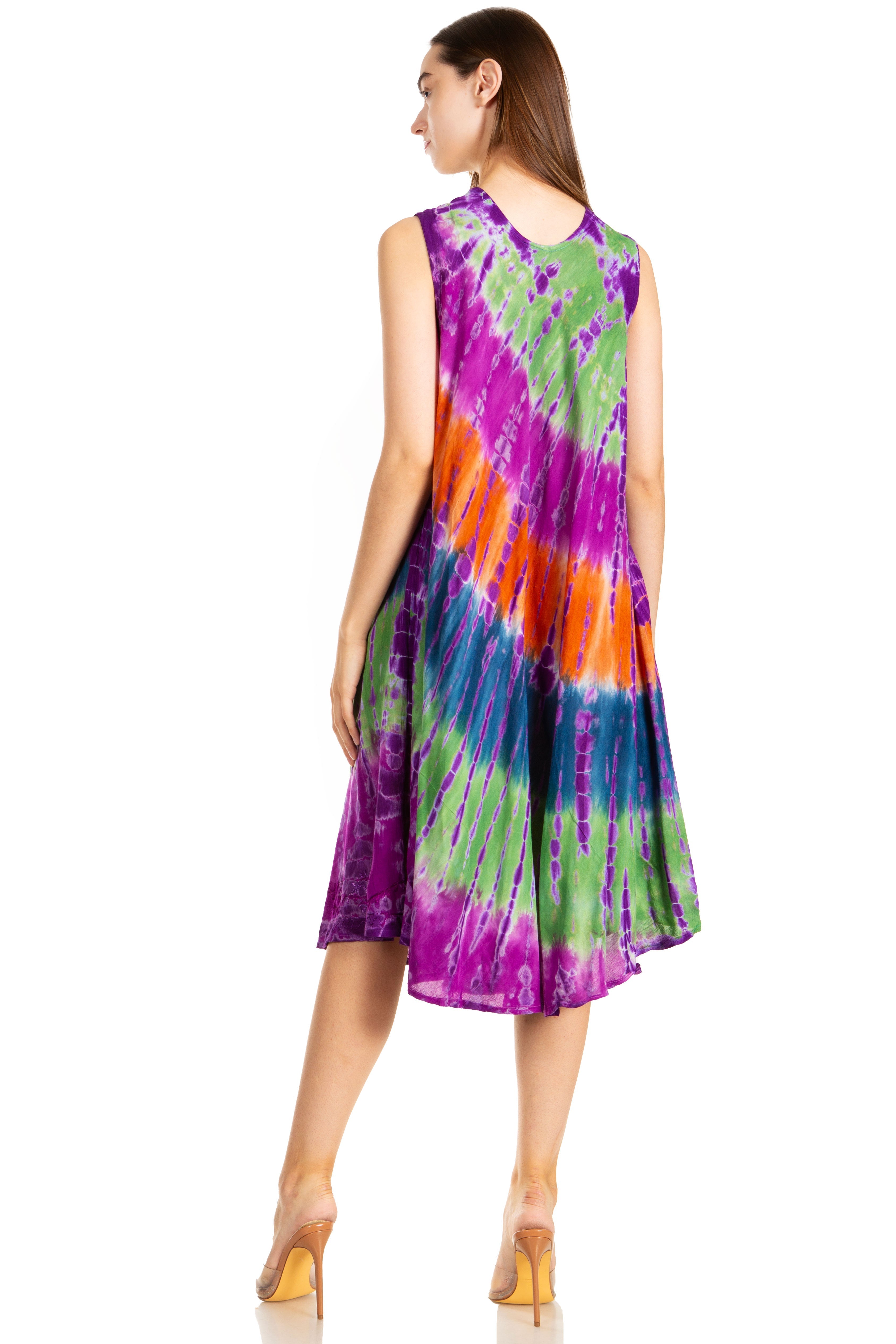 Woman wearing a tie-dye dress on a white background