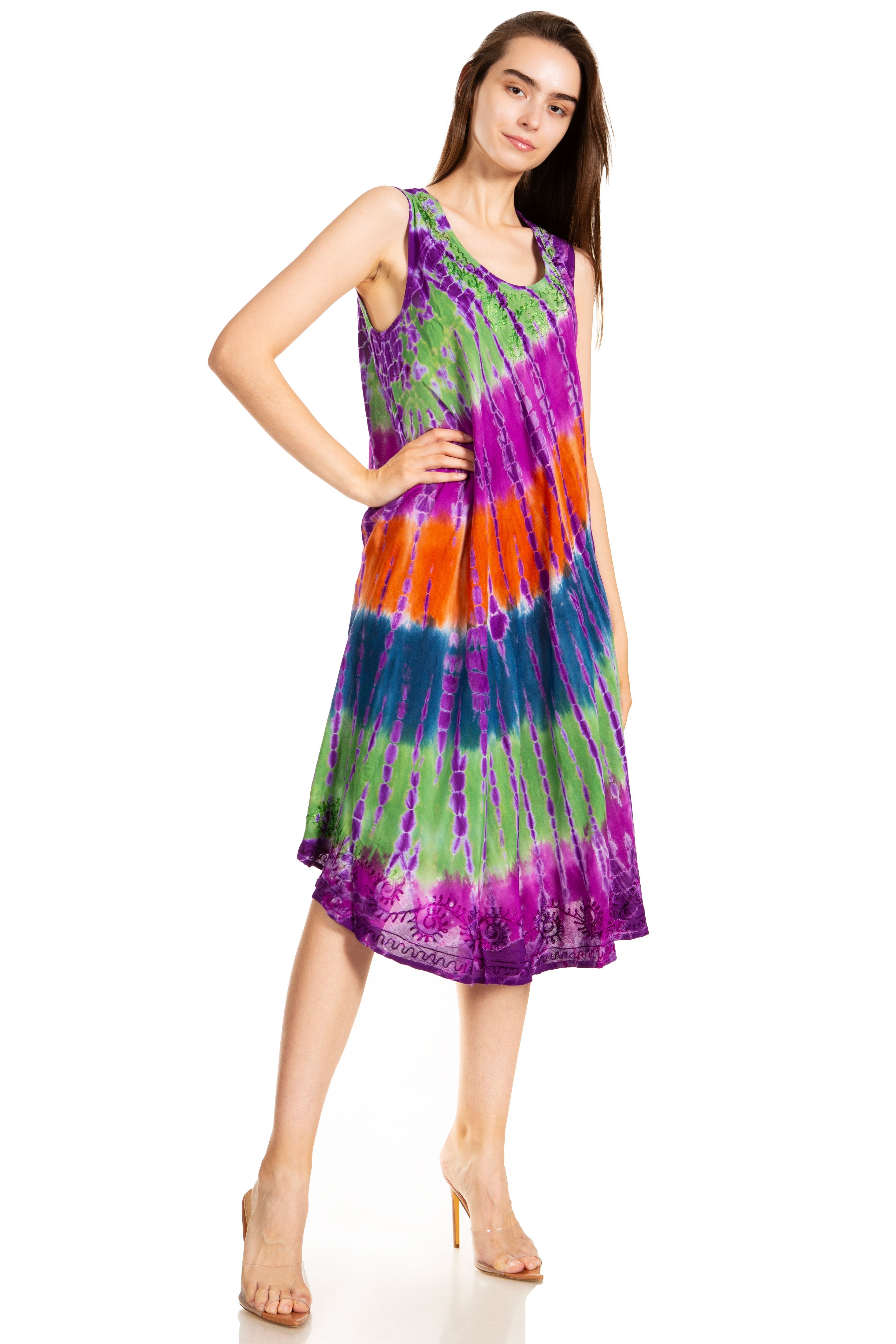 Woman wearing a tie-dye dress on a white background