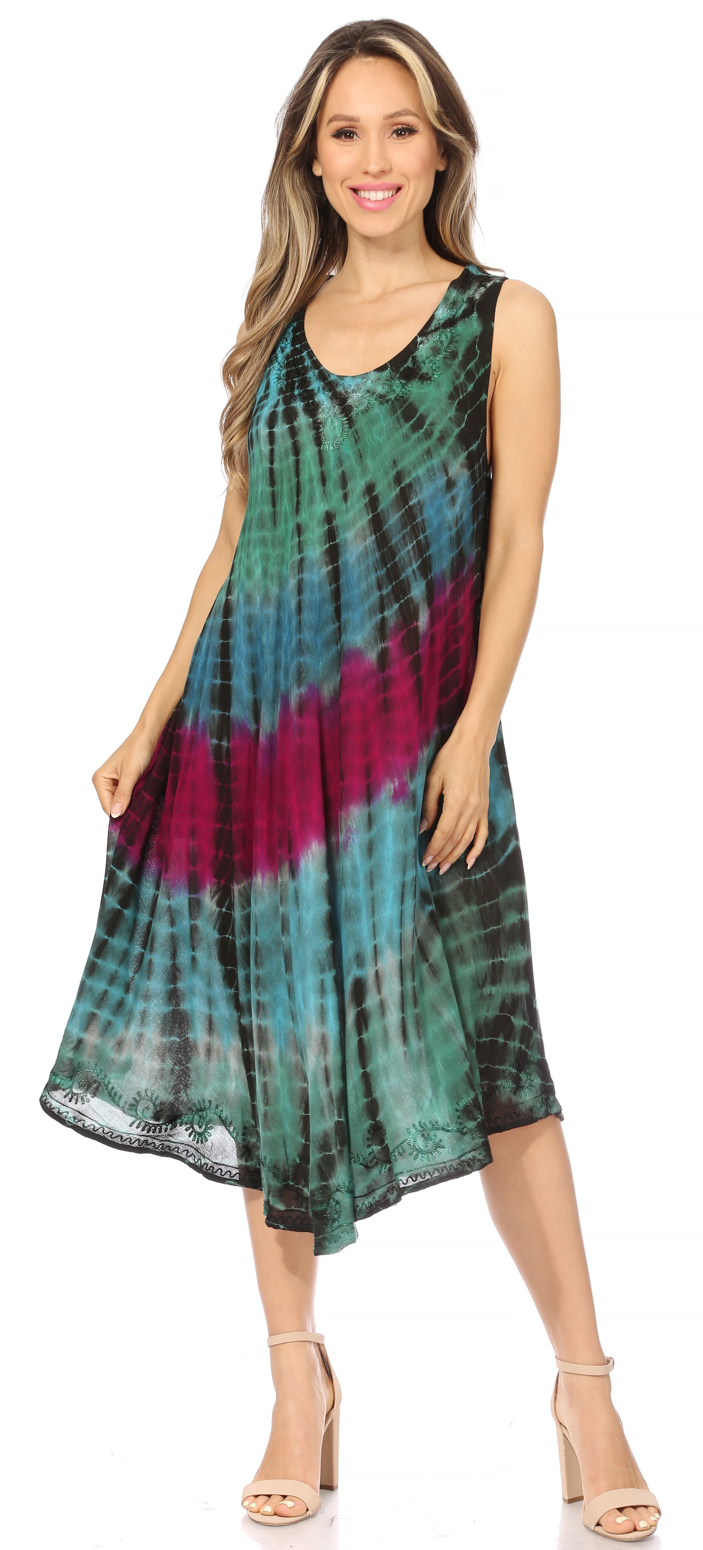 Woman wearing a tie-dye dress on a white background