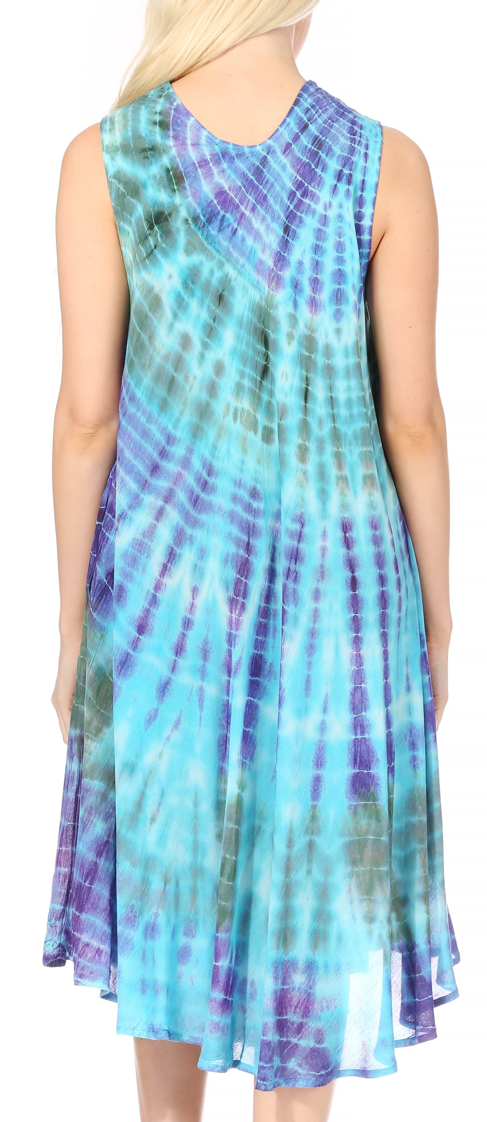 Woman wearing a tie-dye dress with blue and purple patterns.