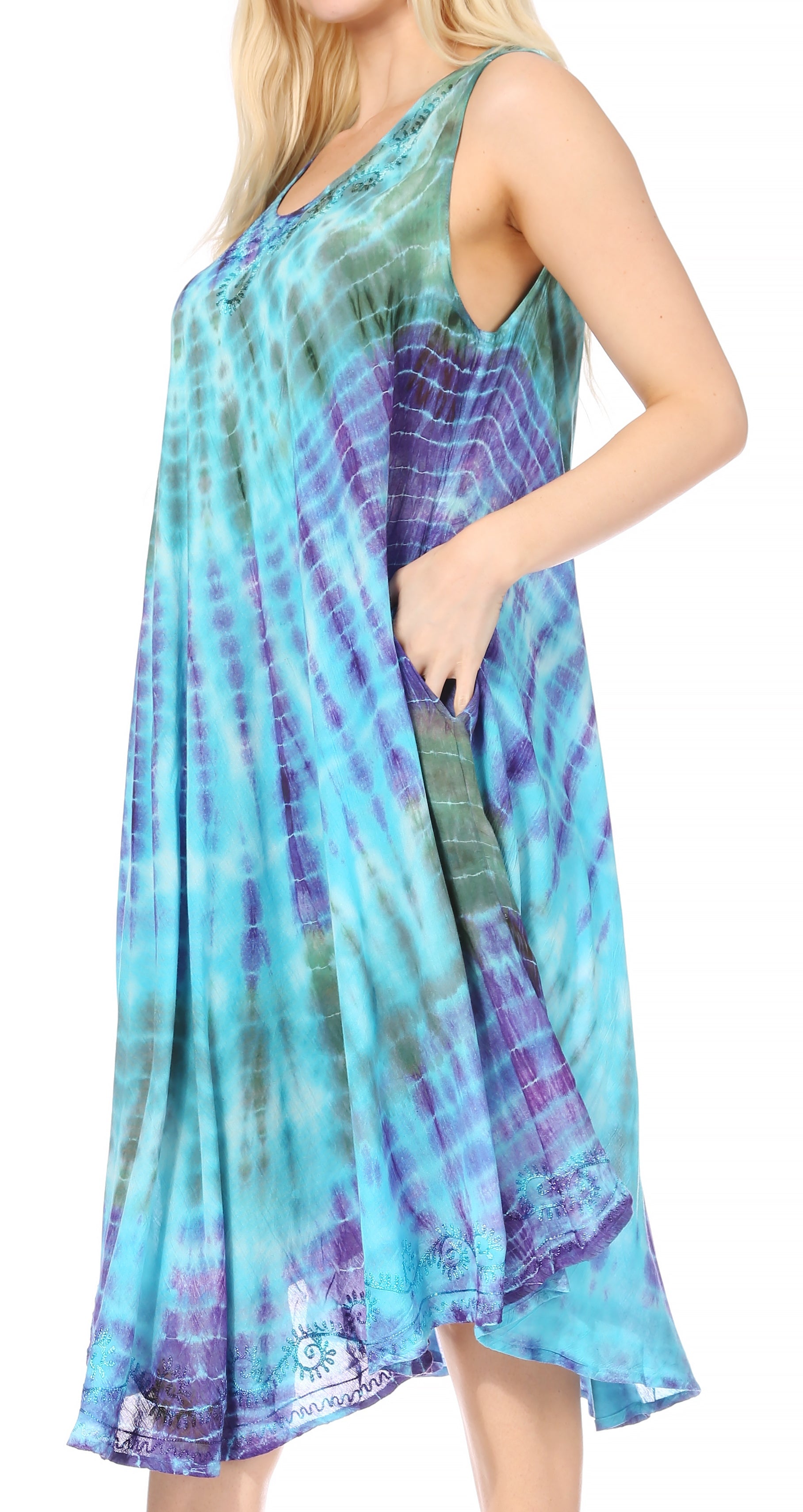 Woman wearing a tie-dye dress with a blue and purple gradient on a white background