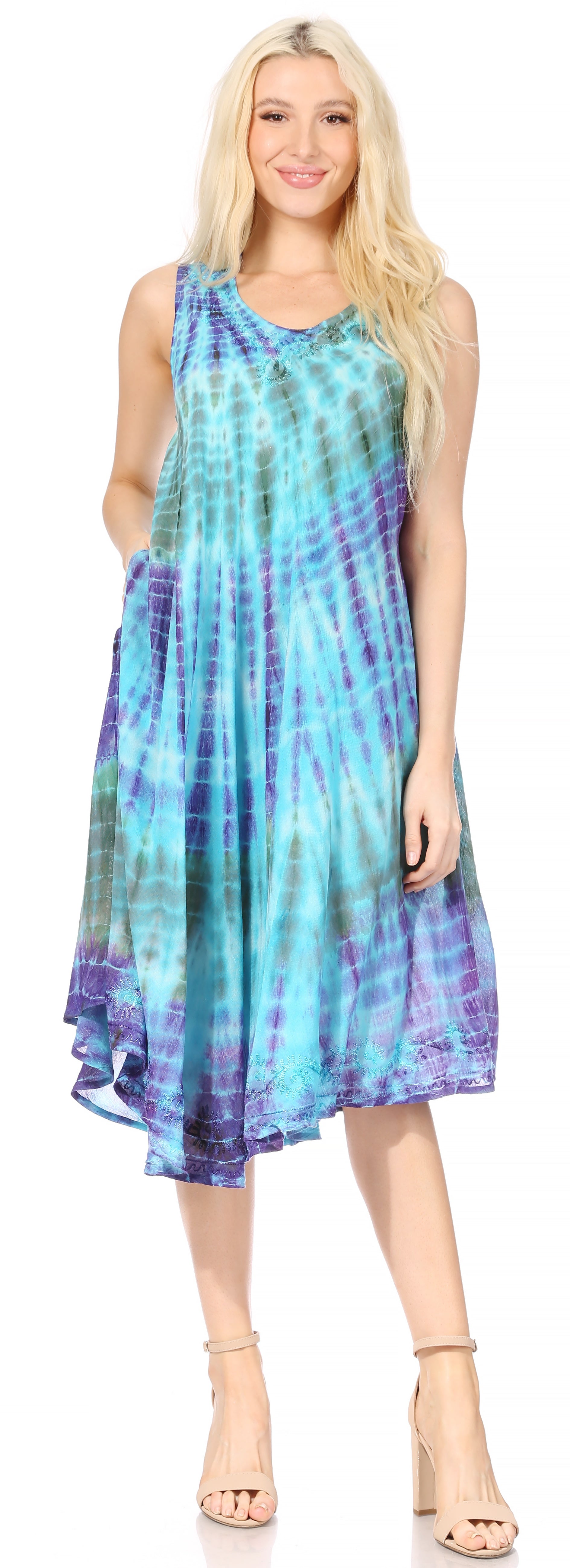 Woman wearing a tie-dye dress with a white background