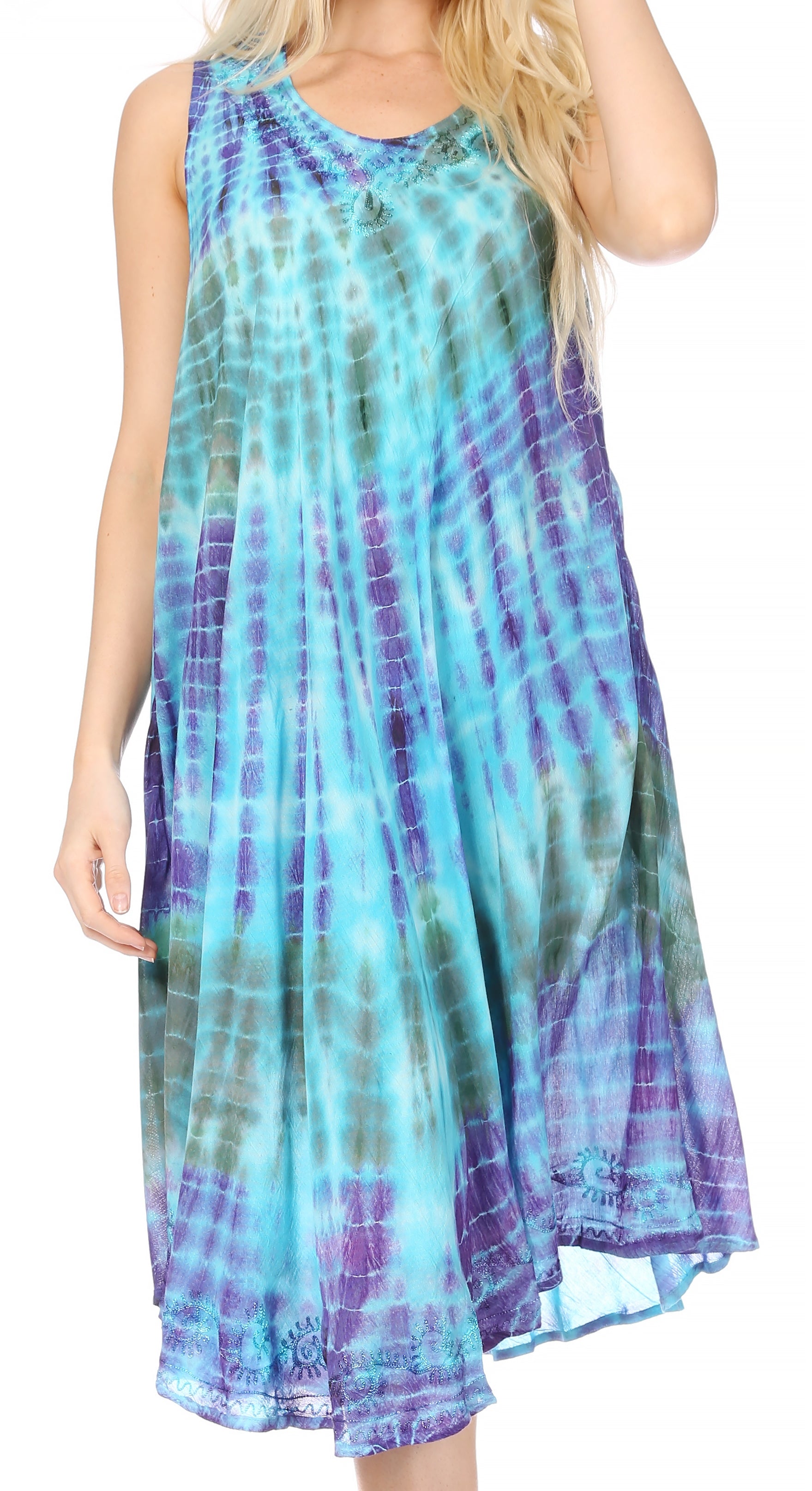 Woman wearing a tie-dye dress with blue and purple hues on a white background