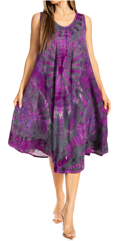 Woman wearing a sleeveless, tie-dye dress with a purple and gray pattern on a white background.