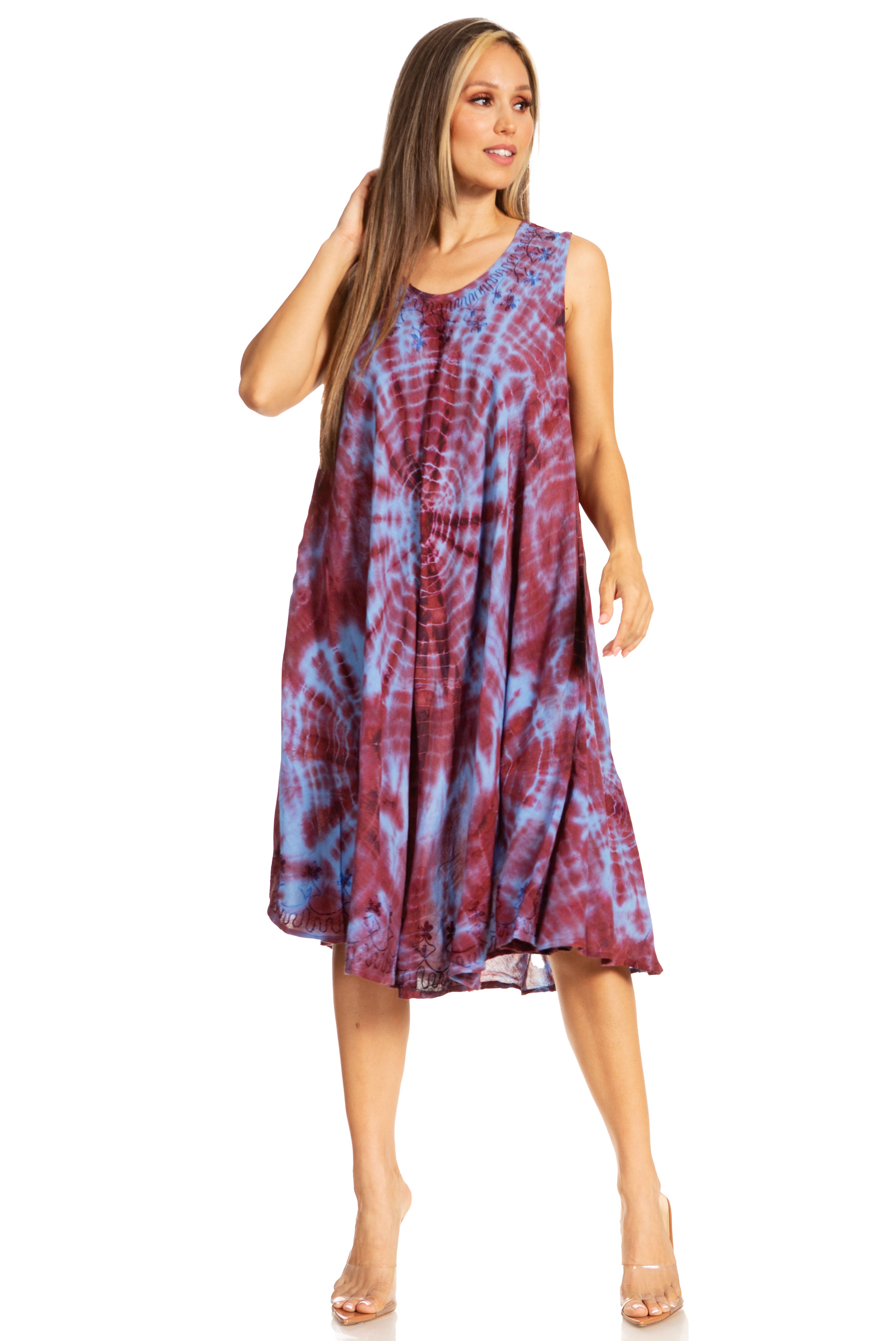 Woman wearing a tie-dye dress on a white background