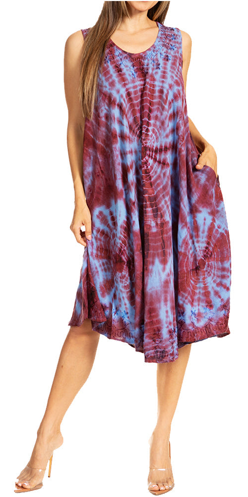 Woman wearing a tie-dye dress on a white background