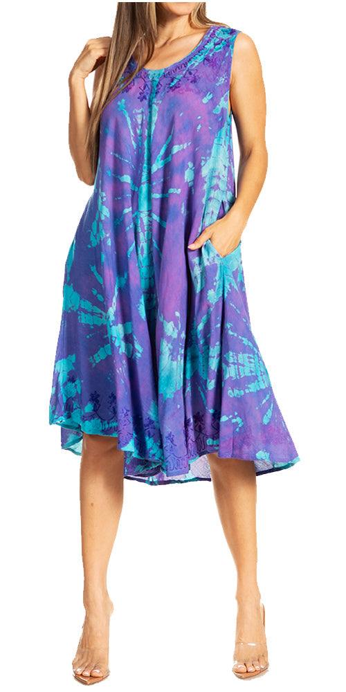 Woman wearing a purple and blue tie-dye dress on a white background