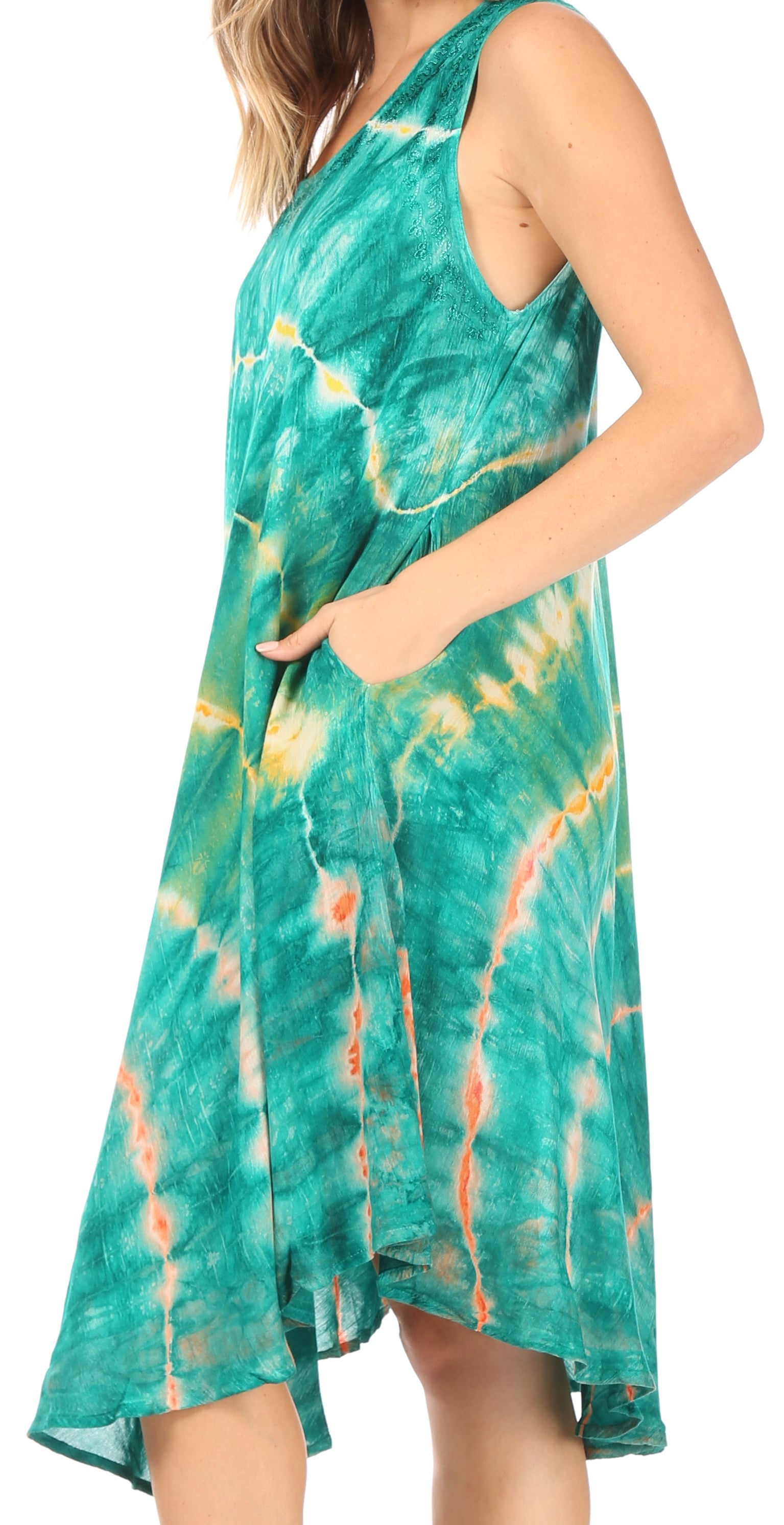 Woman wearing a tie-dye dress with a white background